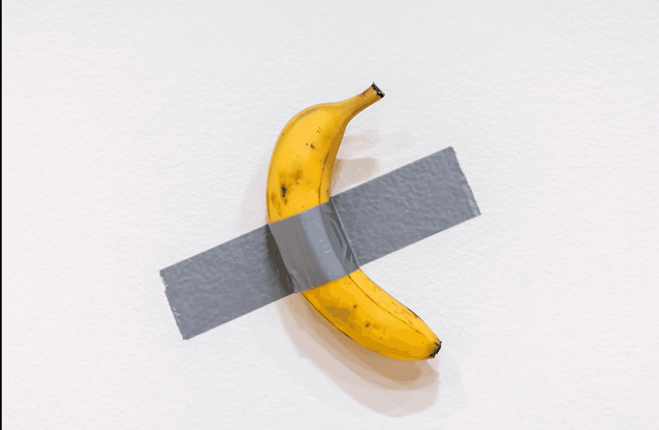 



Italian artist Maurizio Cattelan's "Comedian," a conceptual artwork comprising a banana stuck to a wall with duct tape, sold for $6.24 million in cryptocurency at a Sotheby's auction in New York. Credit: Eduardo Munoz Alvarez/AP
