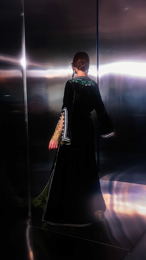 Deep Green Moroccan caftan with emerald embroidery, handcrafted luxury design combining Bahrain atelier and Moroccan craftsmanship
