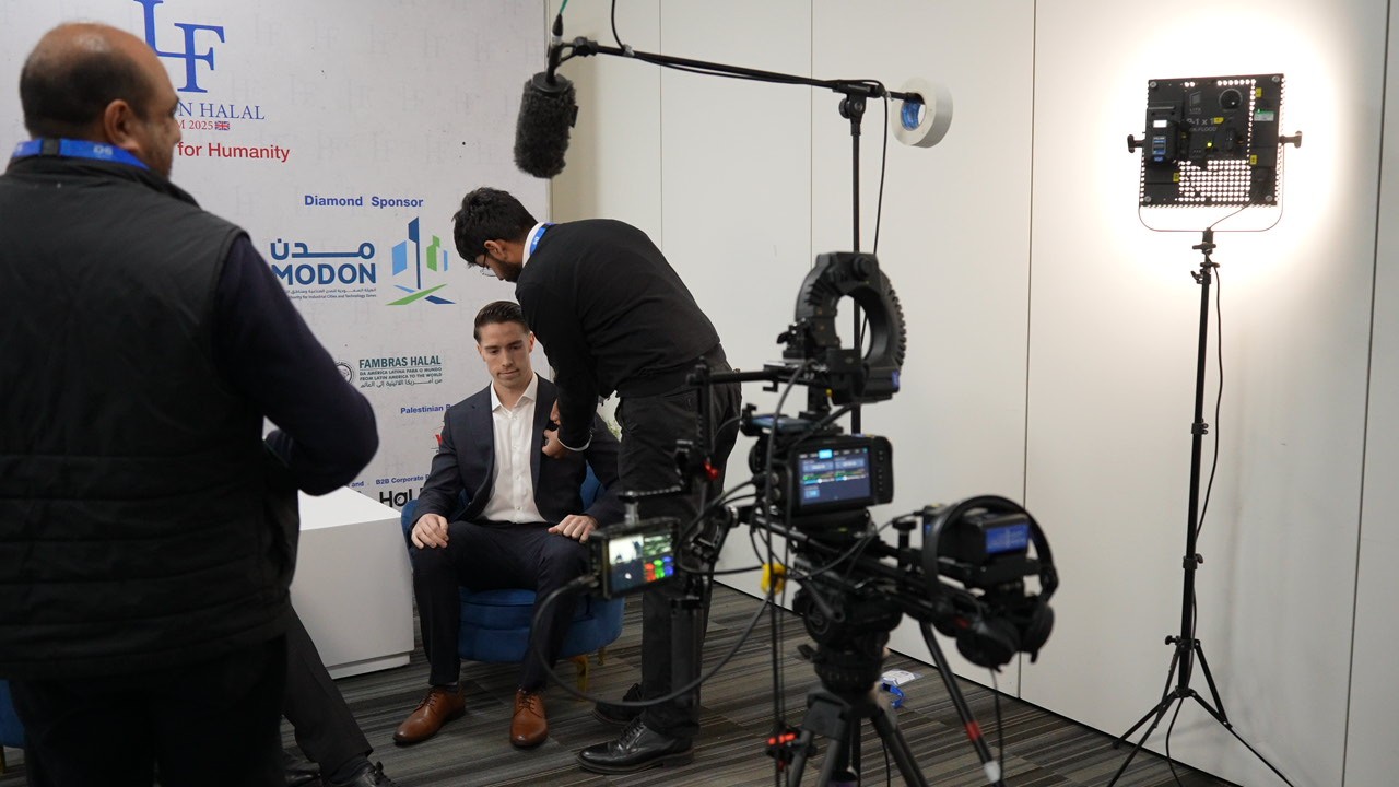 husband and wife working happily on a laptop