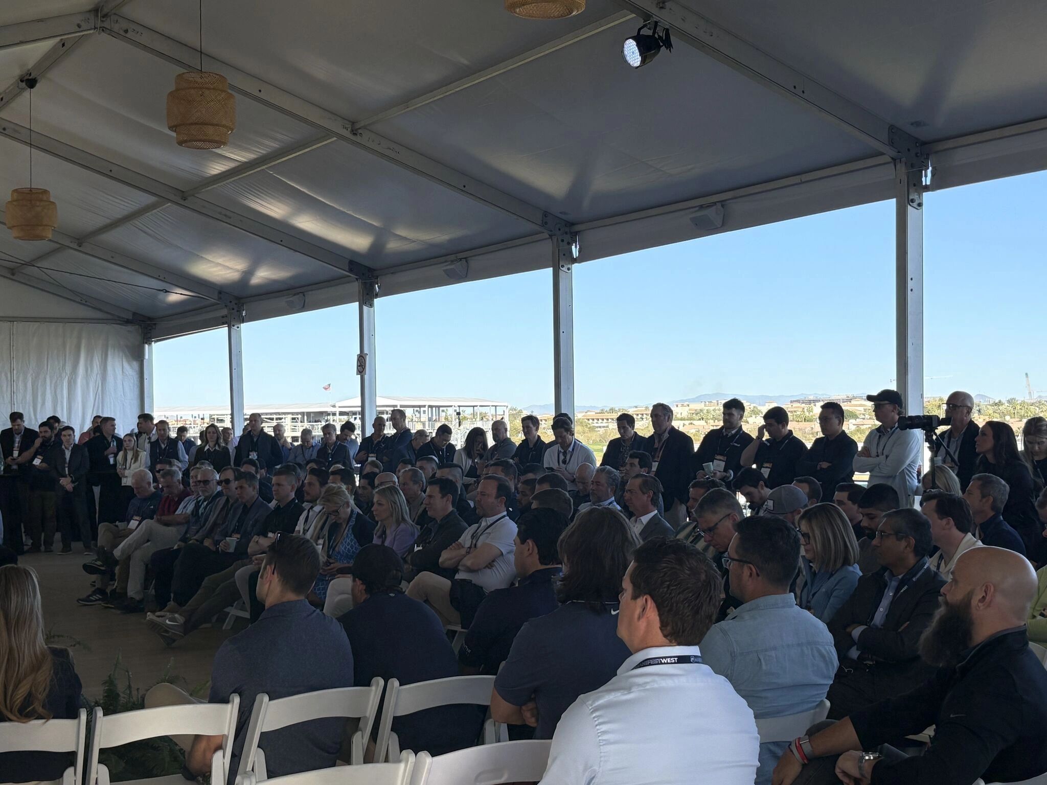 a black and white living room with a large tv