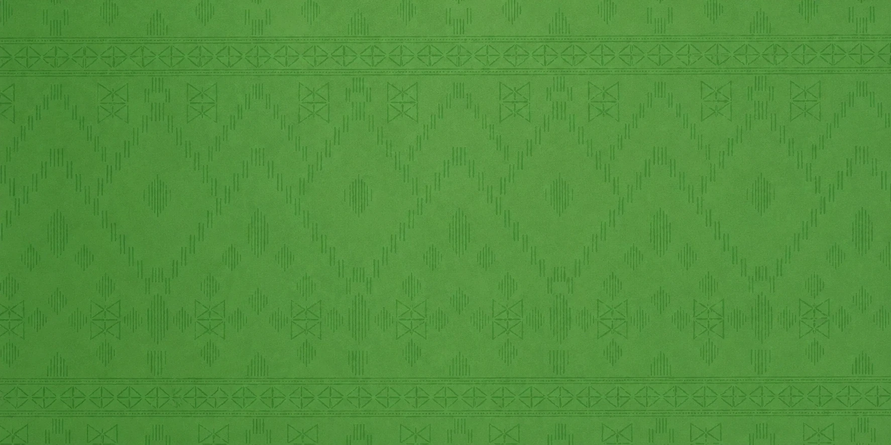 alt="Traditional green pattern background inspired by Indian heritage for Vadhanya branding"