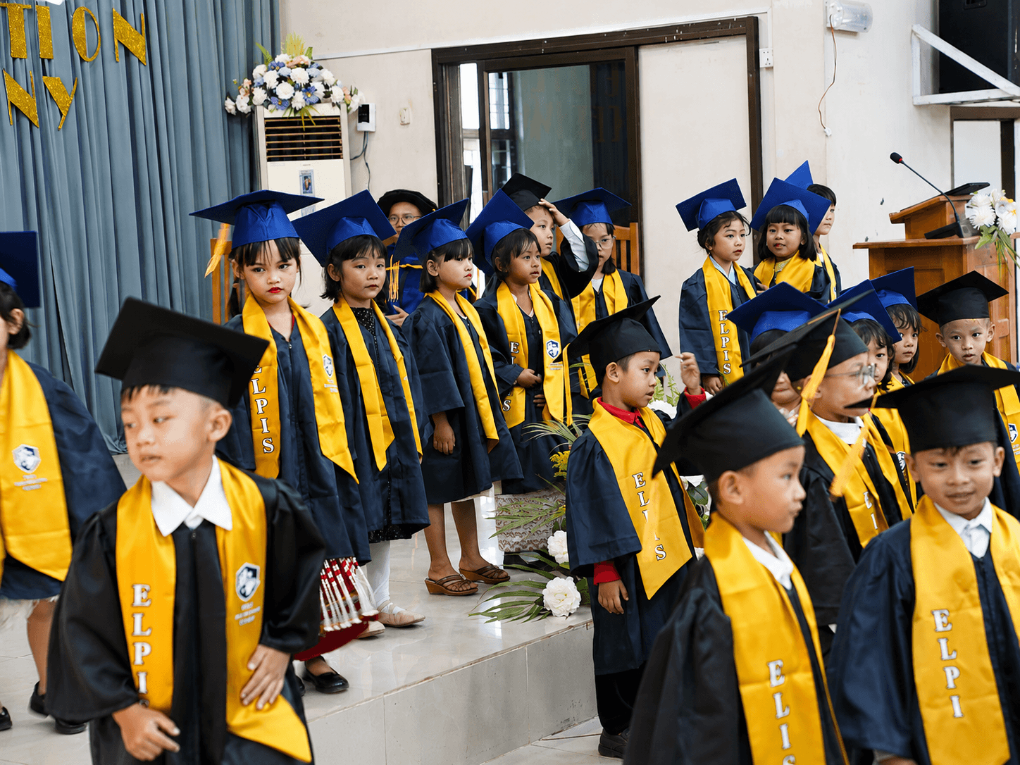 Early years students at Elpis International School taking part in a graduation ceremony in Yangon, MyanmarHero Image