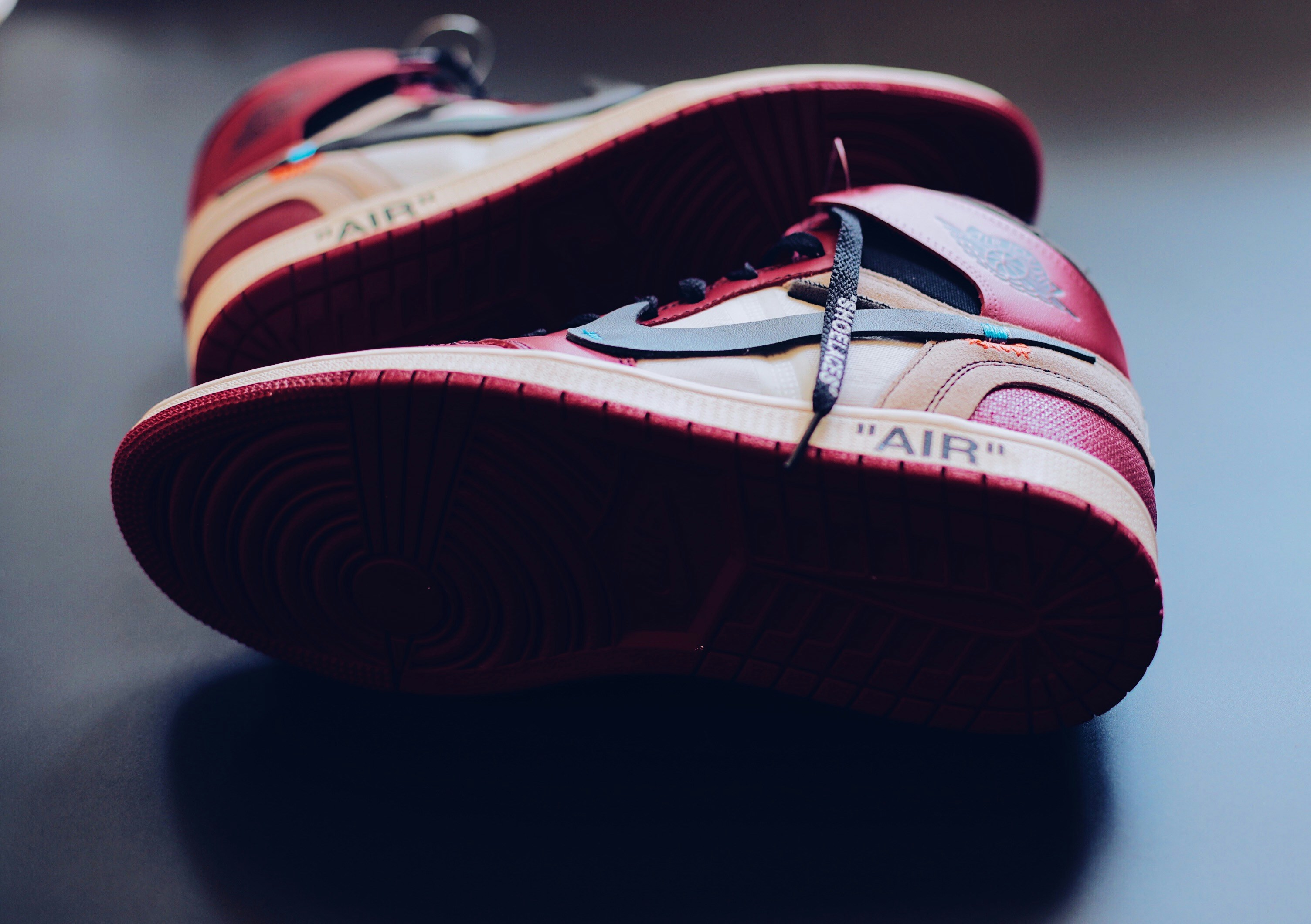 red and black nike athletic shoes