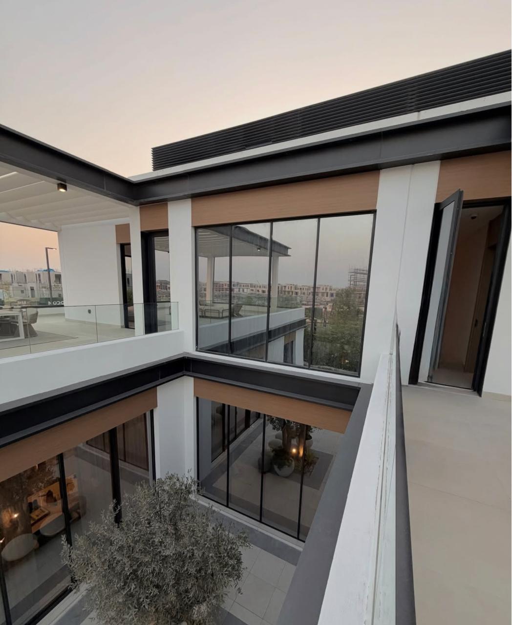Modern villa facade with timber cladding