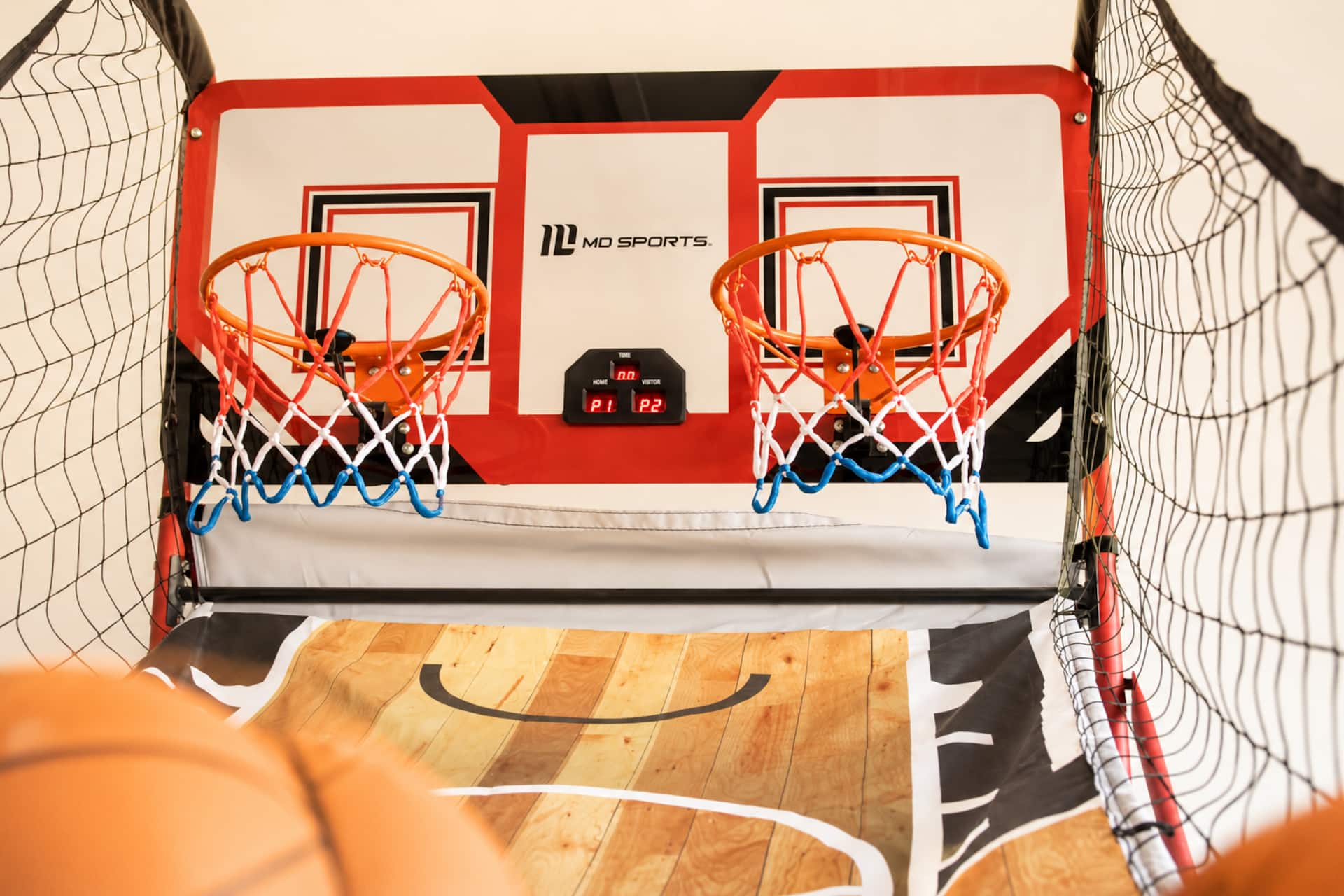 Indoor double basketball arcade game in the game room. Great for friendly competition between guests. Game room also includes additional entertainment options for kids and adults.