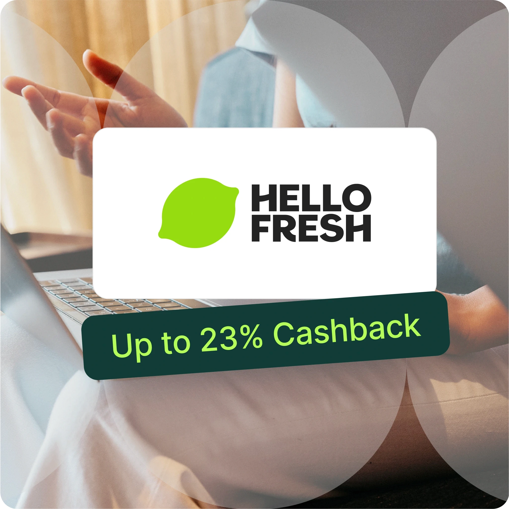 Visual promotion for Hello Fresh displayed on a digital screen, featuring the Hello Fresh logo with a green leaf icon and the text 'Up to 23% Cashback' in bold, bright green letters. The background shows a person using a laptop, suggesting an online shopping or browsing experience, with a sleek design emphasizing the cashback offer.