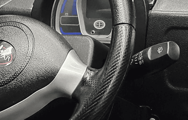 A boat tows a float on the water.