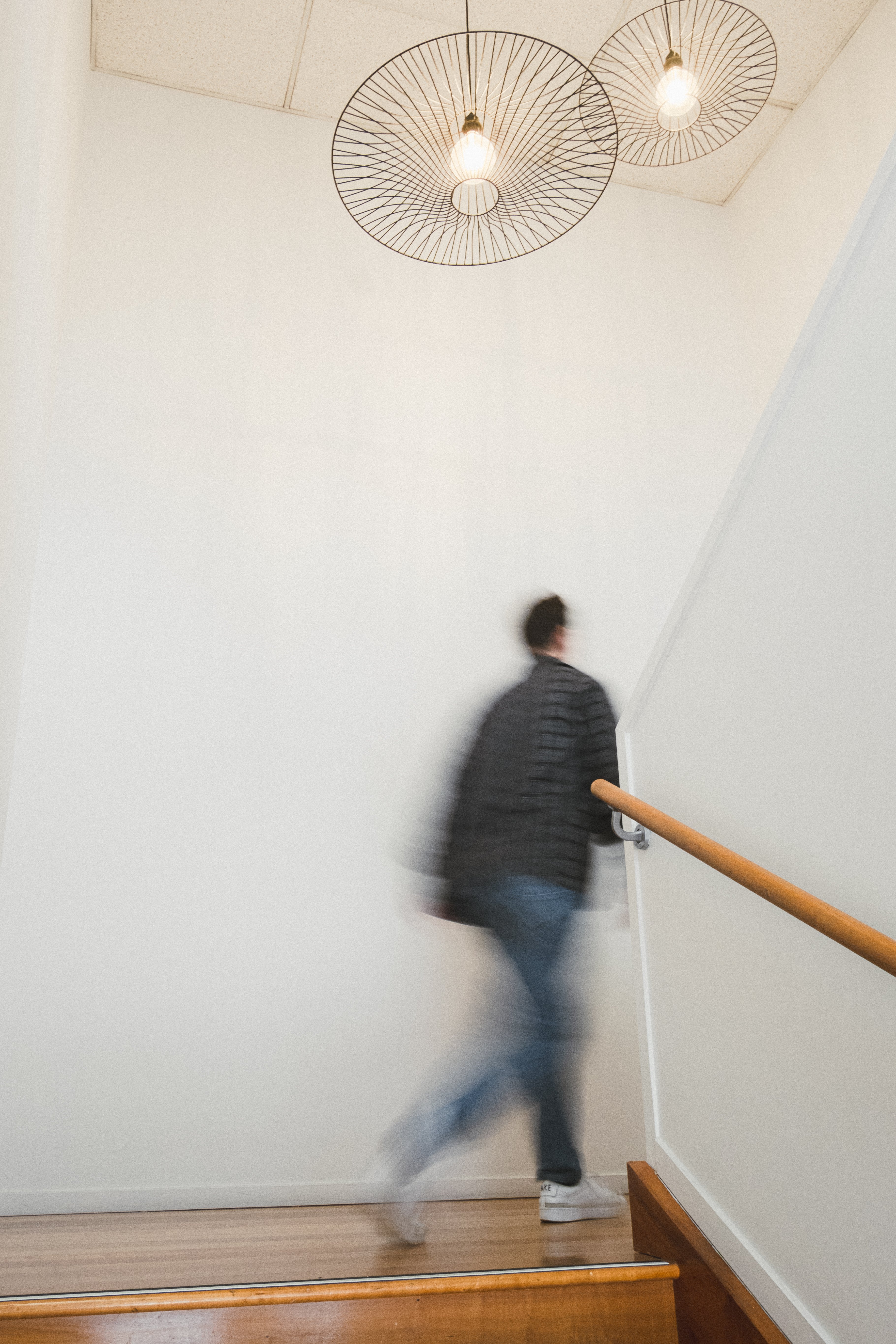 Image of Scott walking up the stairs