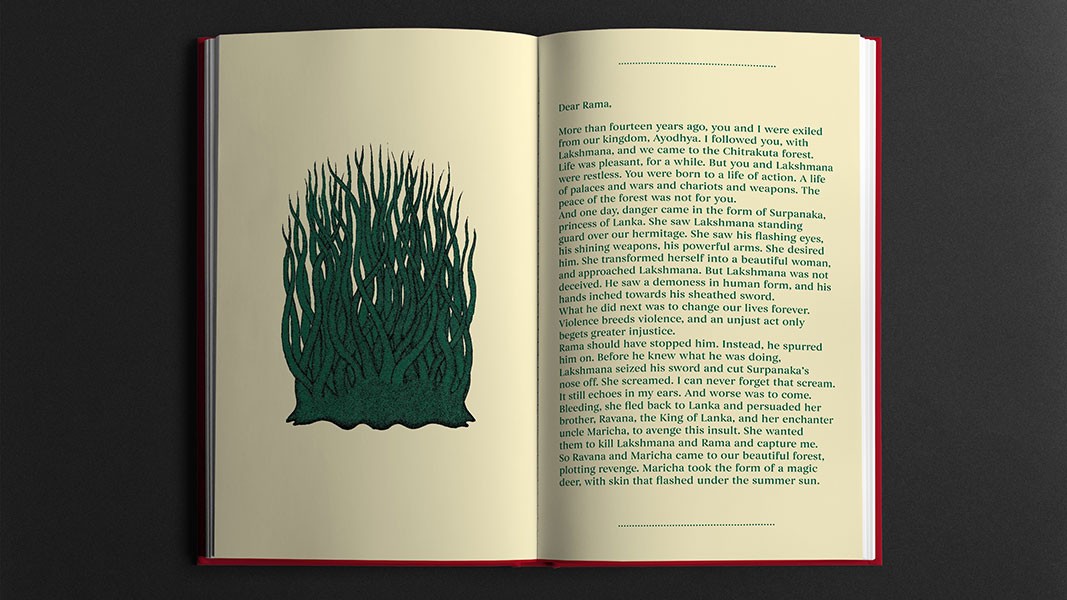 An open book displays a page with a dark green illustration of grass on the left and a text passage on the right. The text begins with "Dear Rama," followed by paragraphs of narrative. The book has a cream-colored pages and a red spine. The illustration and text are set against a dark background.