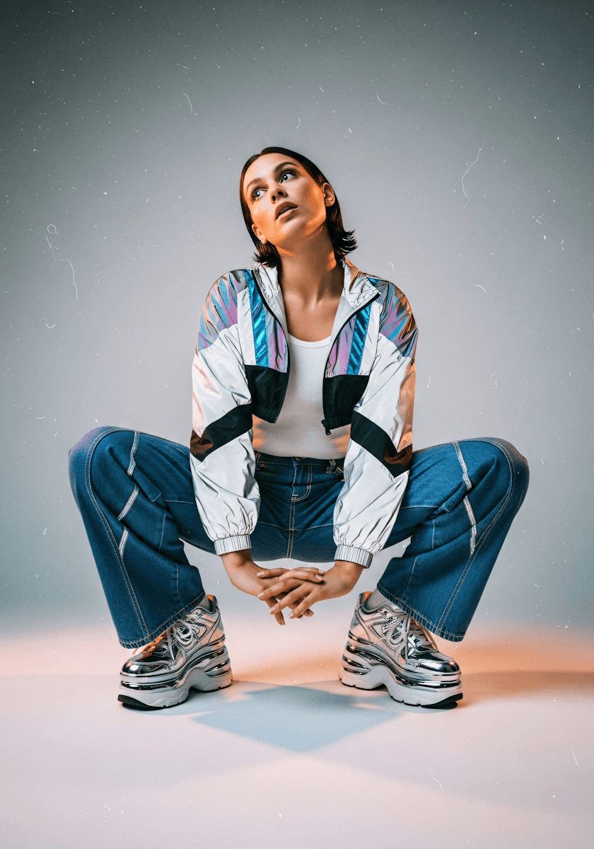 Stylish model posing with wearing shoes