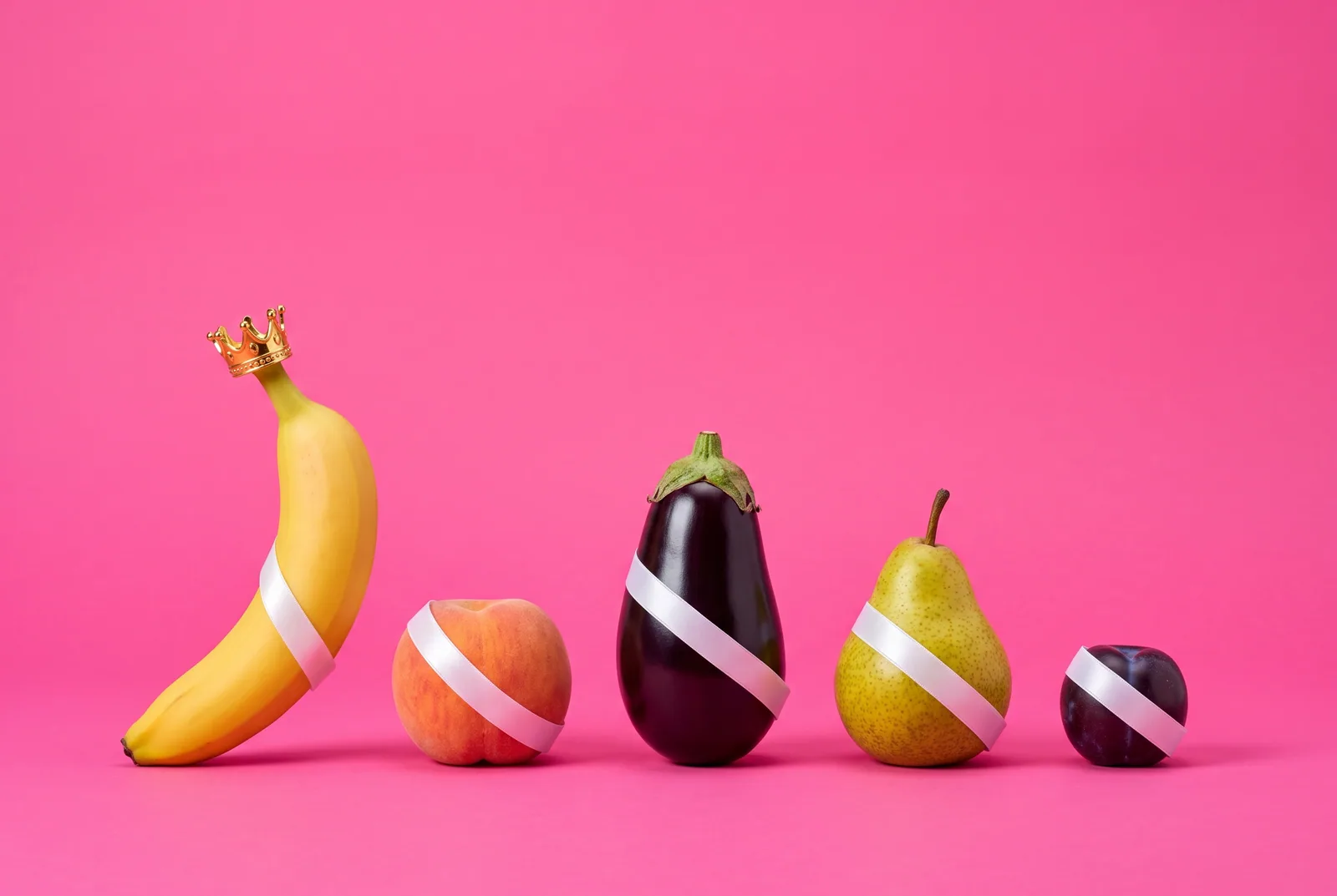 A banana with a gold crown leading a queue of fruits in satin sashes, the best Fortify alternatives ranked