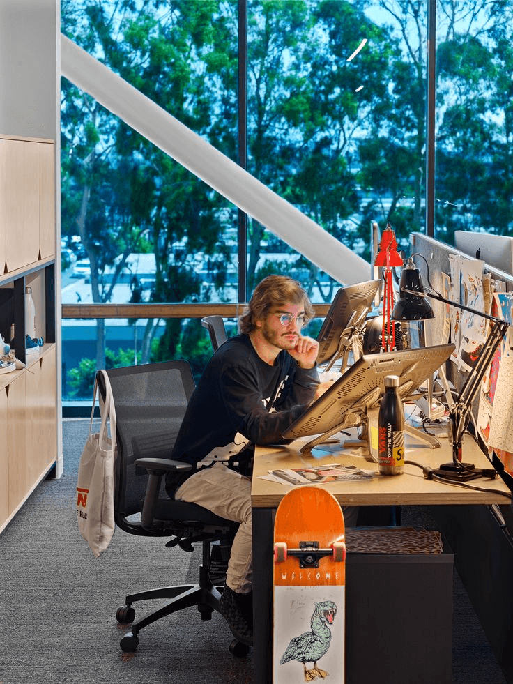 Engineer working with industrial robotics showcasing innovation and AI transformation