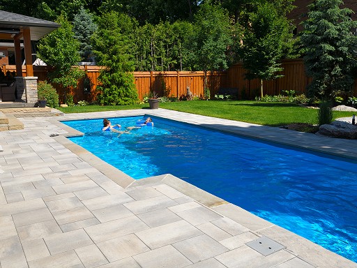 Family Enjoying Their Clean Pool