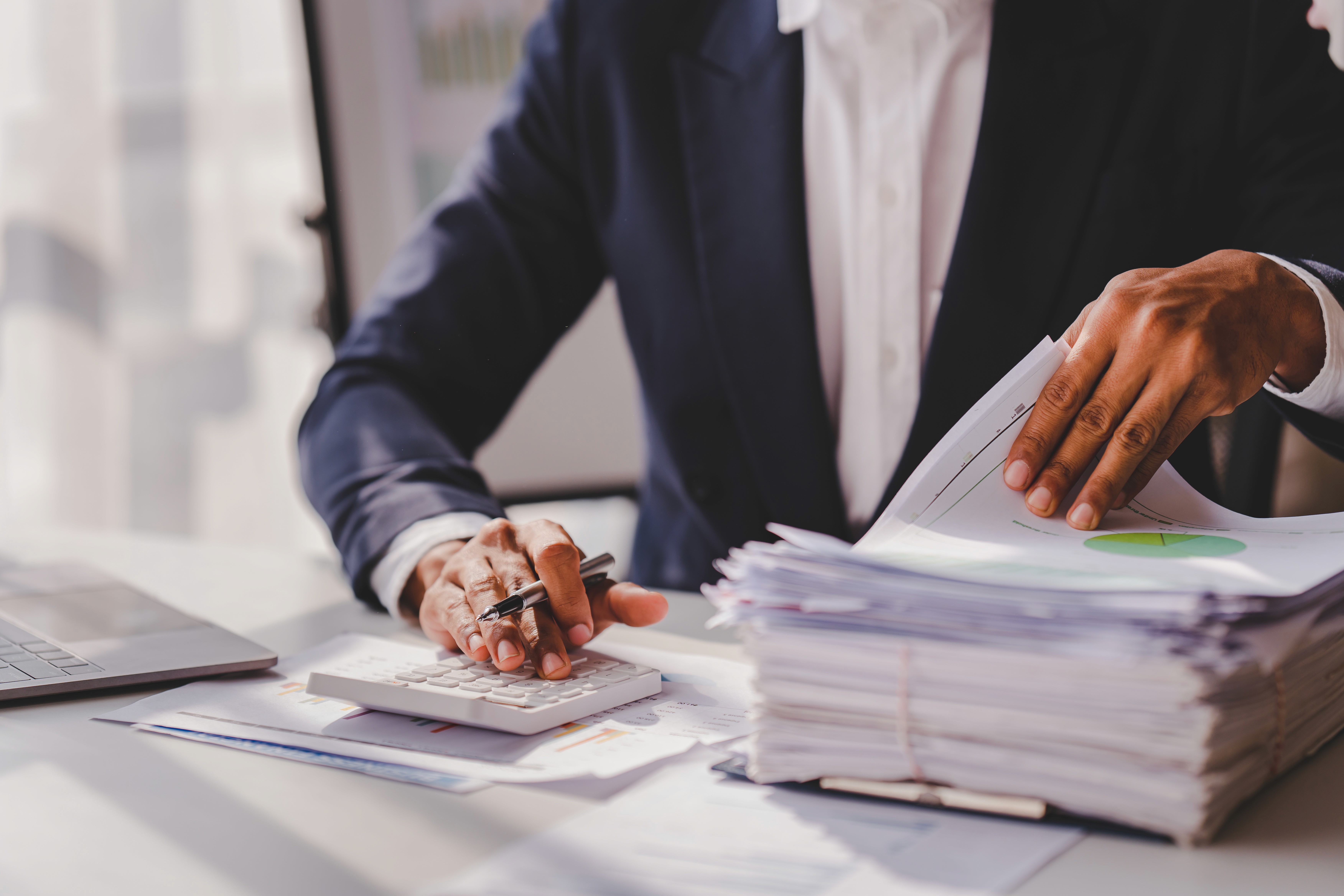 Maritime financial controller processing invoices