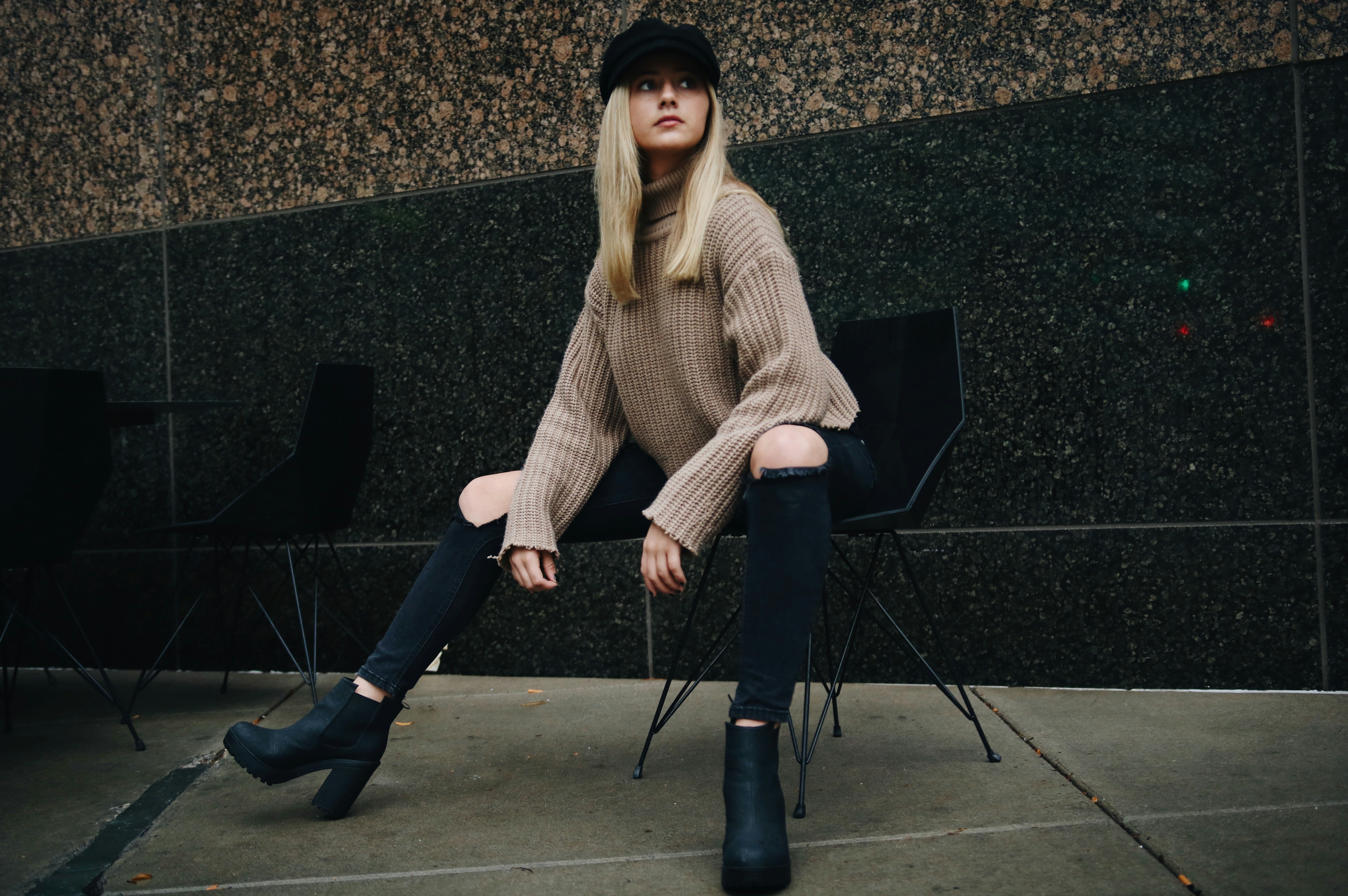 Girl Sitting on Chair - Fall Outfits With Boots