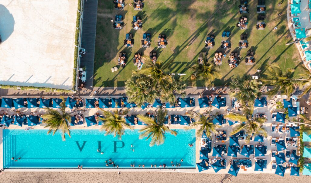 Aerial view of a luxury pool at a Jimbaran VIP resort with professional agent guidance.