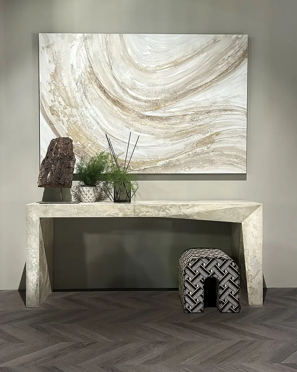 Modern italian console with sculptural stone look and artistic design elements, perfect for luxury home furniture or luxe interiors.