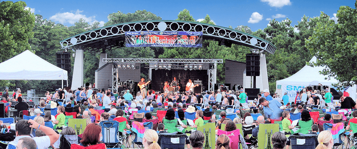 Excited crowd gathered around the main stage at The Heritage Festival in Slidell Louisiana