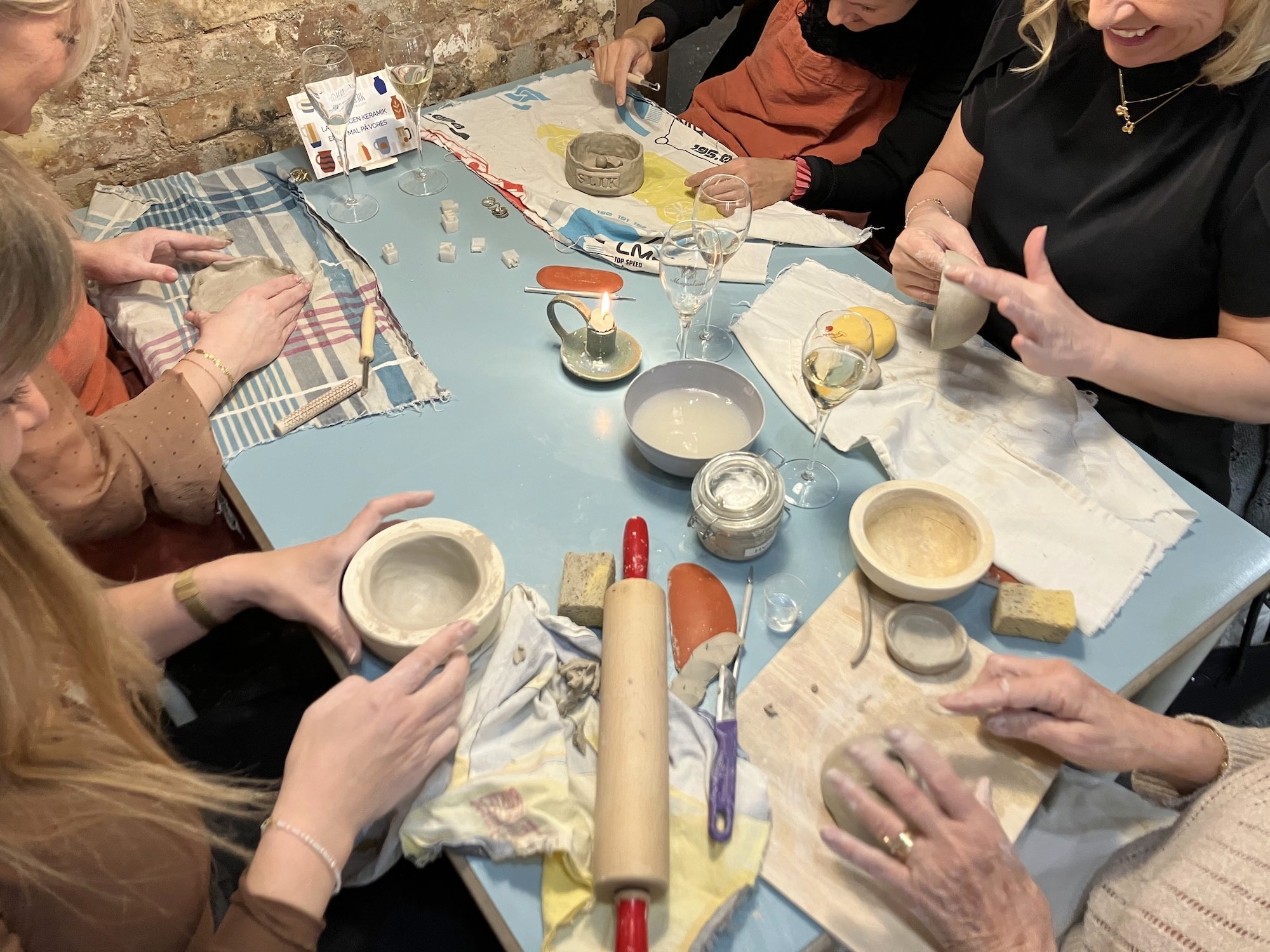 friends working at their clay project
