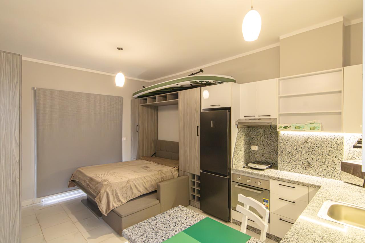 black and white wooden table and chairs