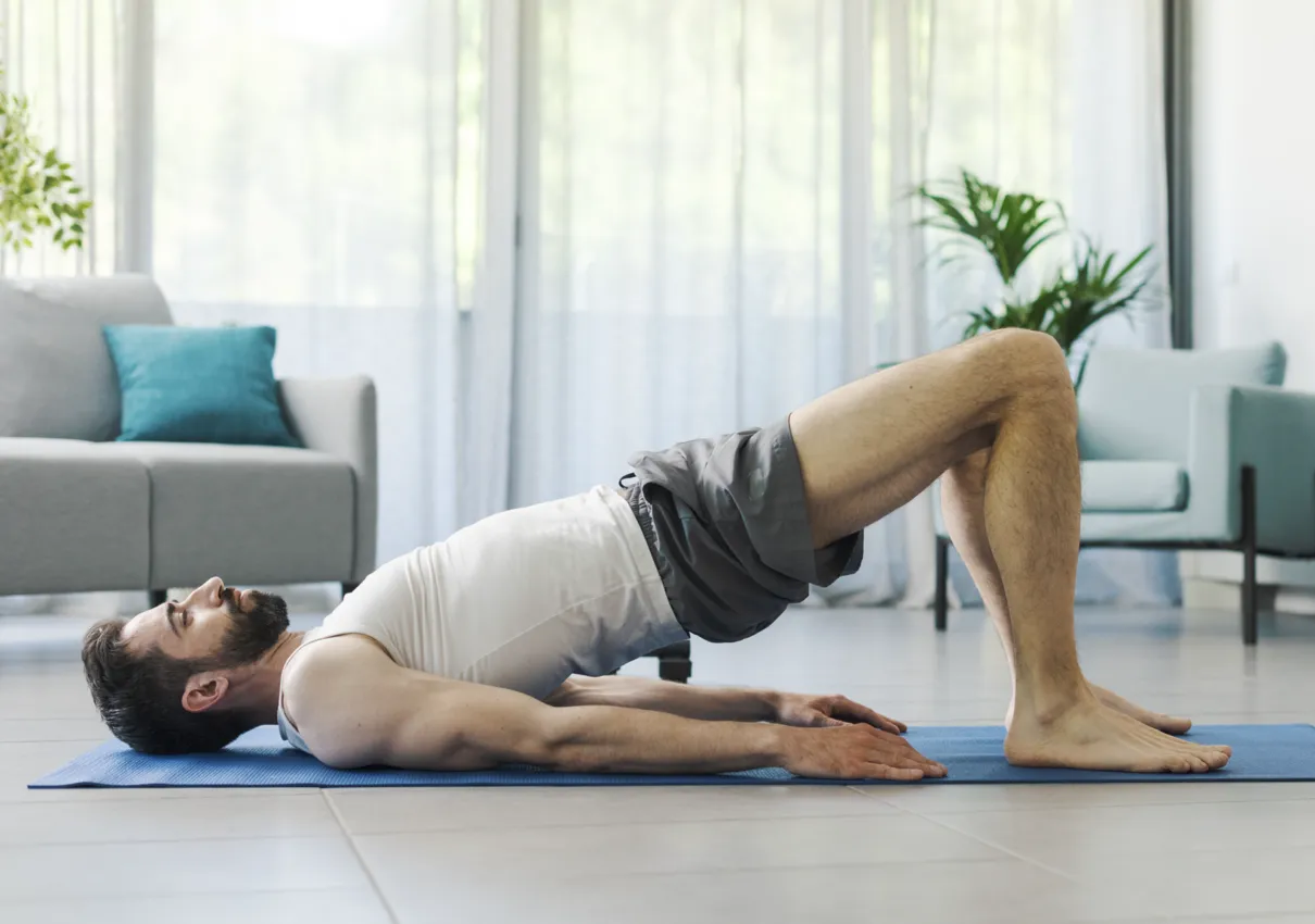 man in bridge pose