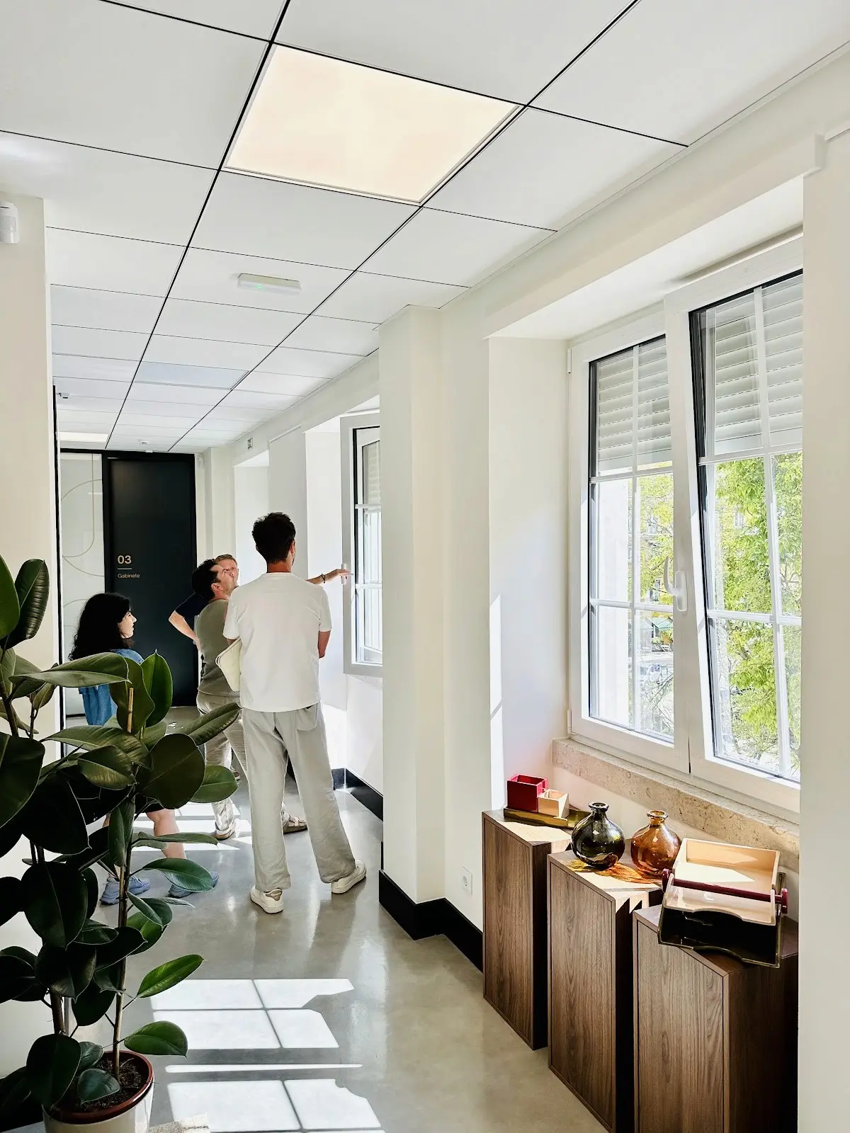 Members walking through the TejoMed clinic hallway