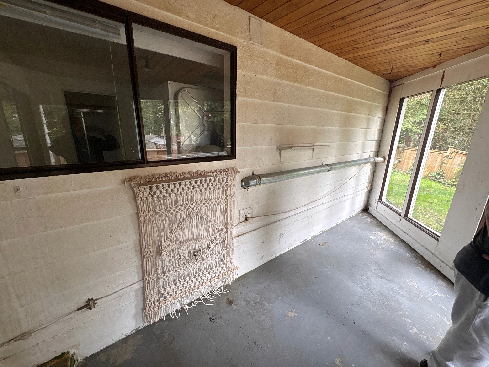 Enclosed porch and sunroom before repair and restoration work.