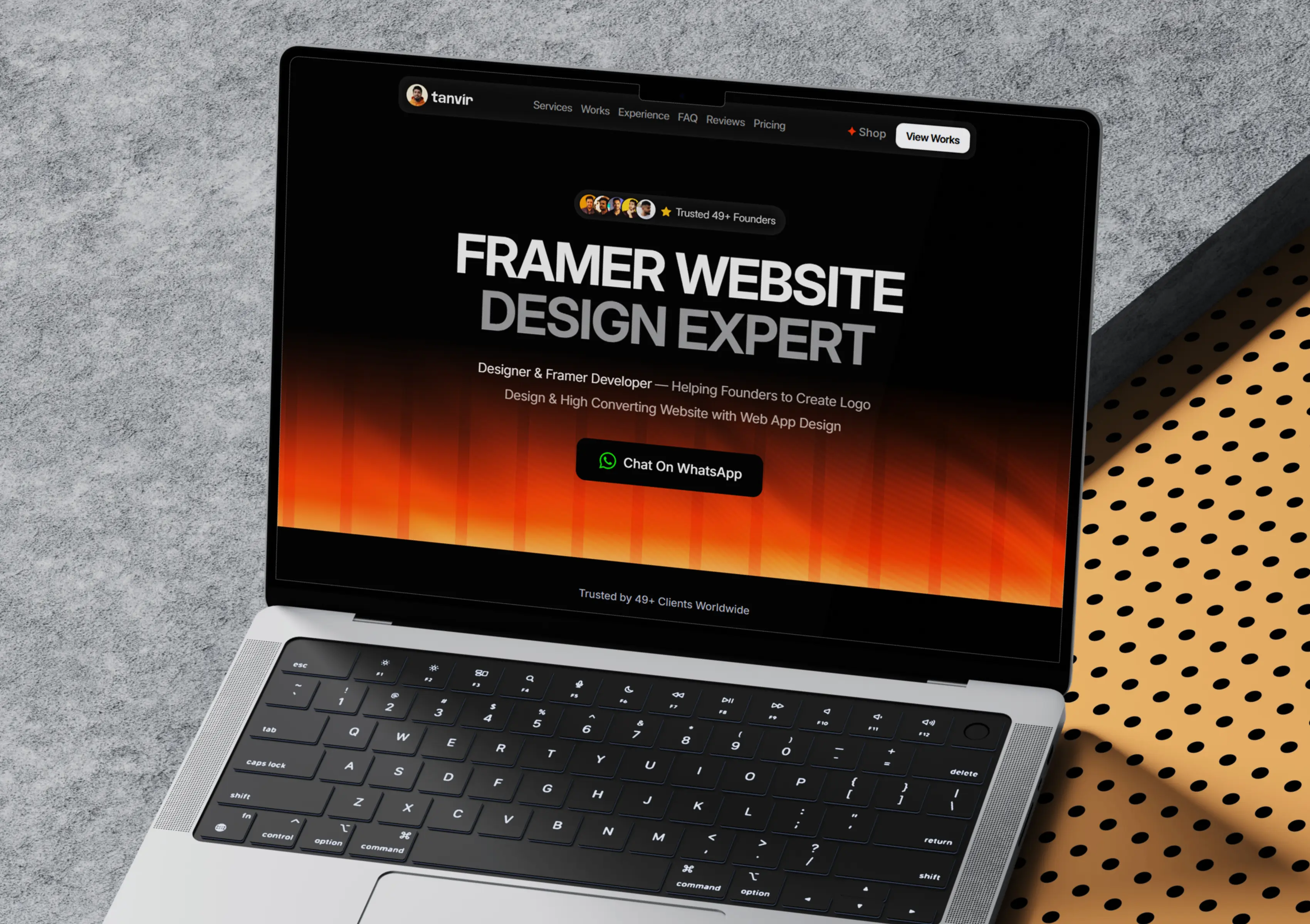 An orange cat sleeps peacefully on a bed.