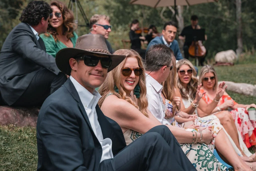 Wedding guests enjoying ceremony in Aspen mountain setting