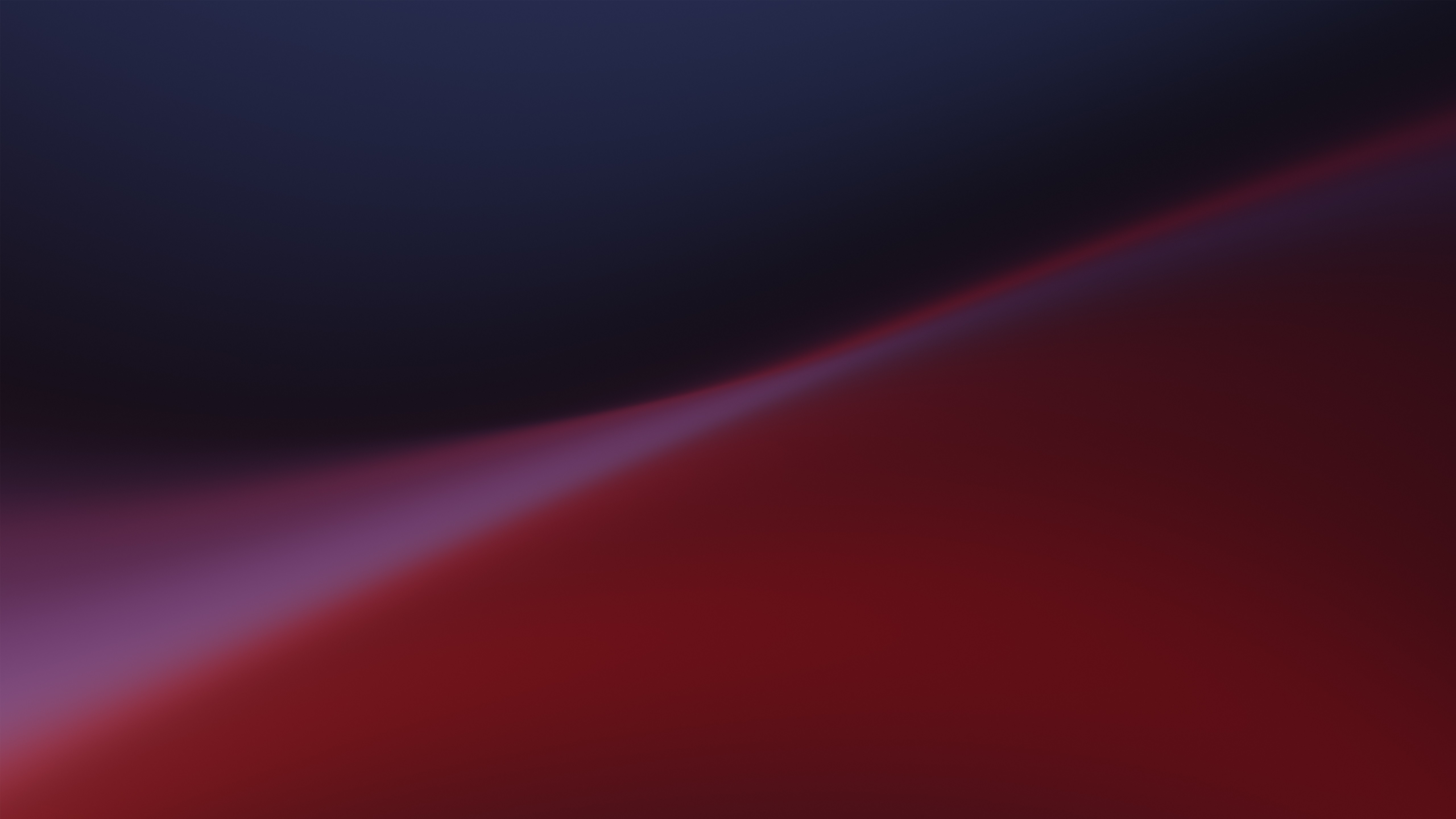 Artistic portrait with red and blue lighting creating a dramatic effect