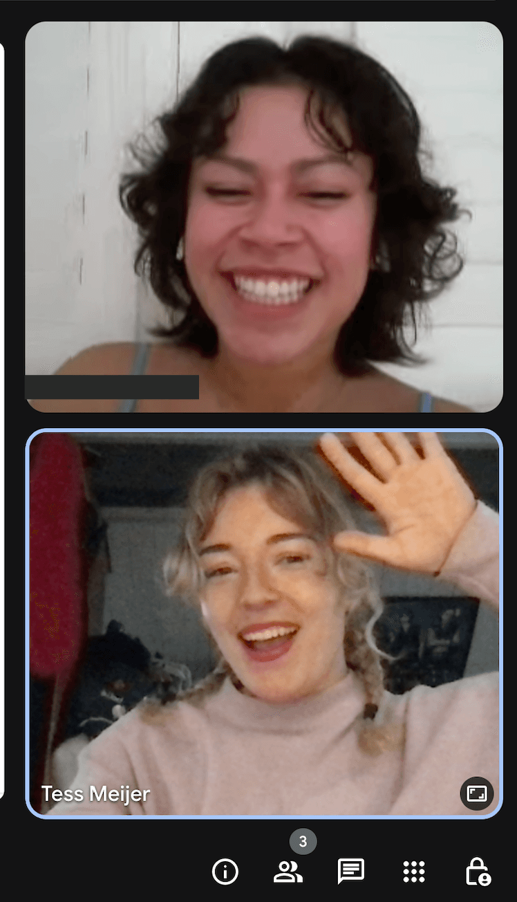 Tess sitting on an empty road with arms wide open, embracing freedom and new beginnings.