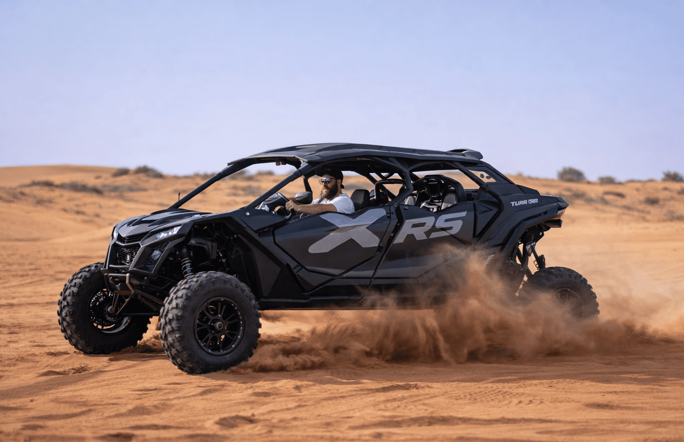 Group desert safari experience featuring a luxury 4-seater buggy from Dune Quest Tours