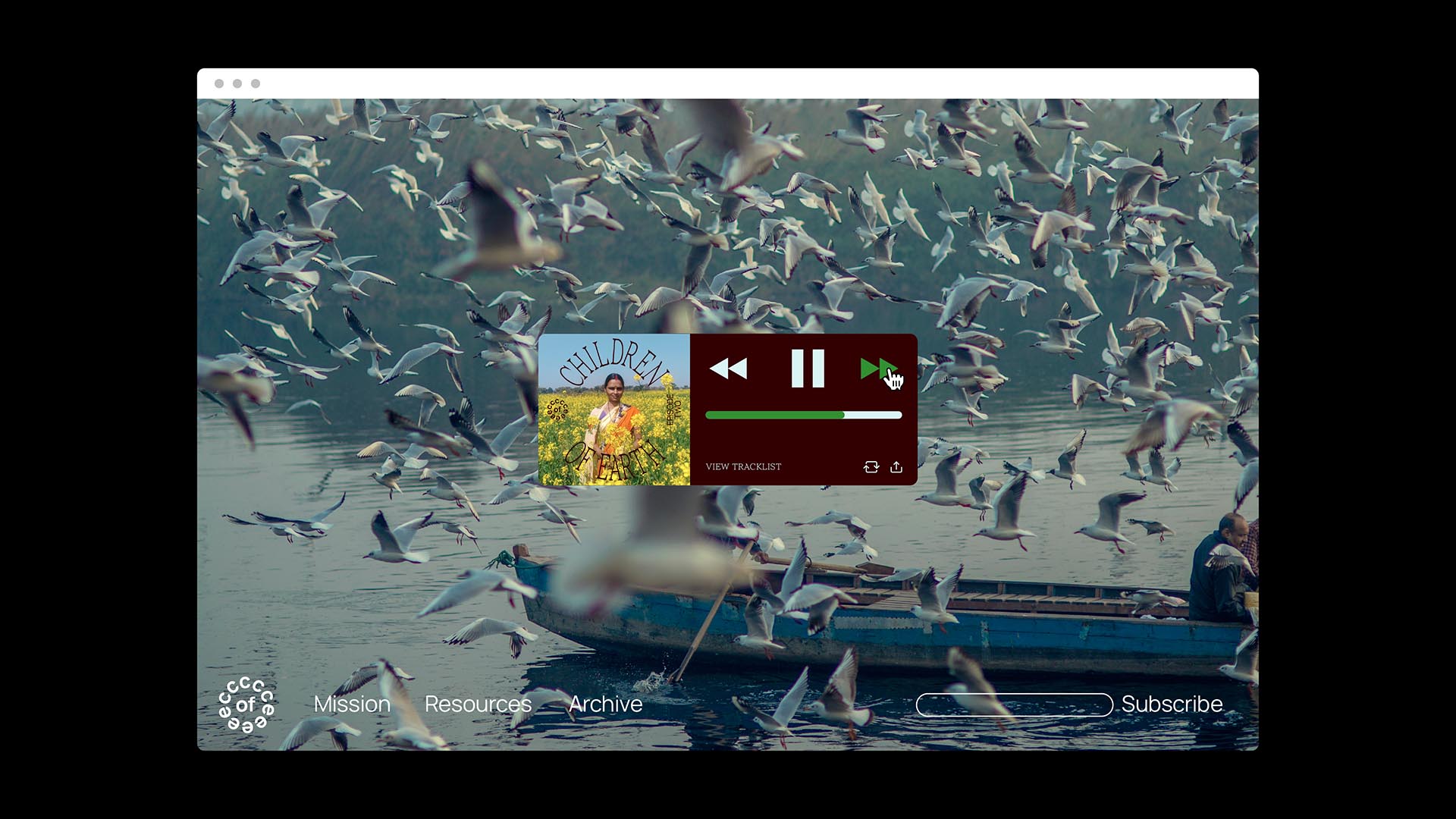 A screenshot shows a music player interface on a Mac OS X system. The player displays a song titled "CHILDREN OF" with a green progress bar, indicating playback progress. The song is playing from a folder labeled "Children of Earth" and is currently playing at "0:00". The player interface includes standard controls: a play/pause button, a skip button, and a volume control (up and down arrows). The background shows a calm body of water with numerous seagulls in flight. In the bottom left corner, the text "Mission: Resources: Archive" is visible. In the bottom right corner, "Subscribe" is displayed.