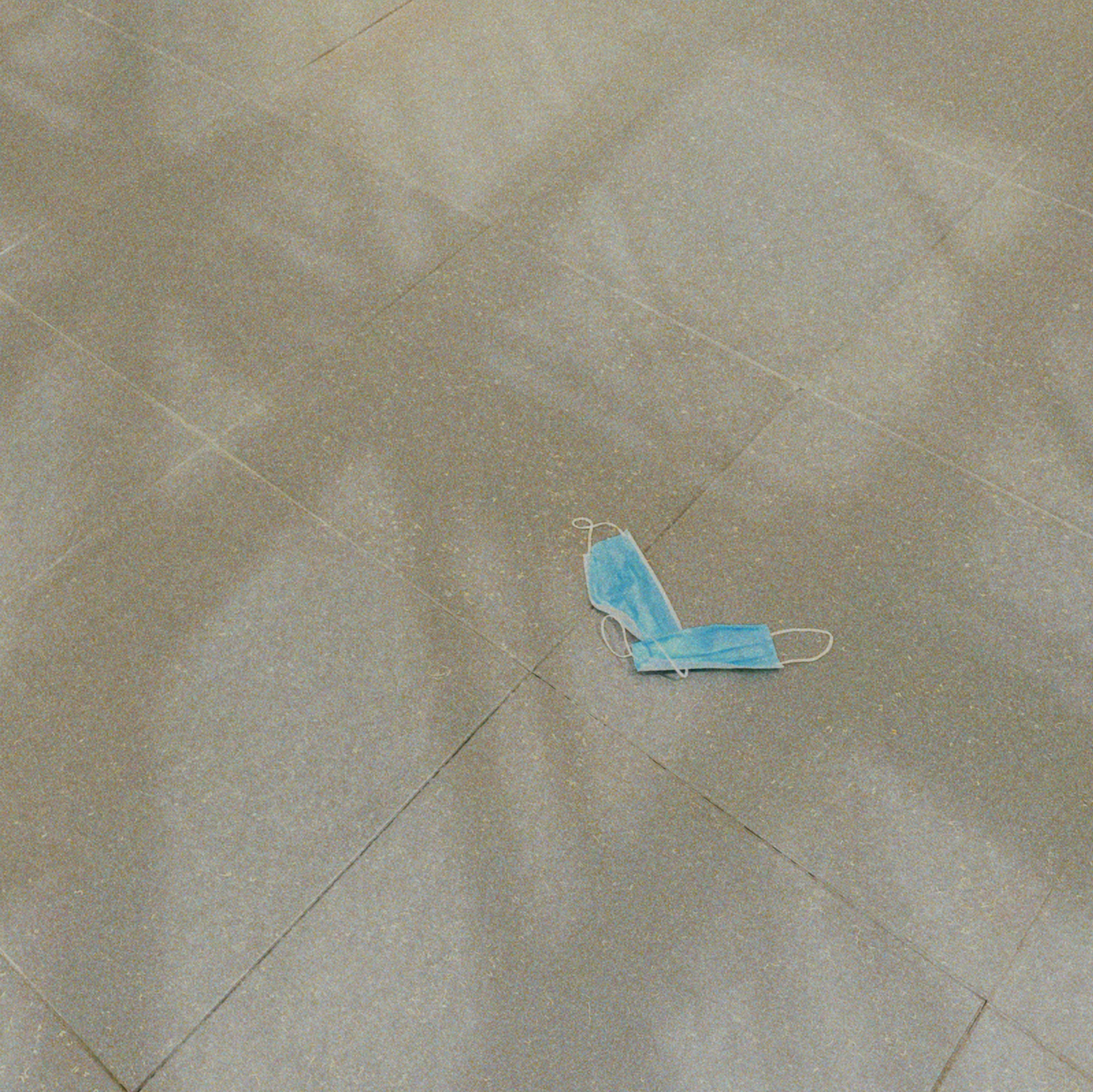 A blue object on the floor of a room