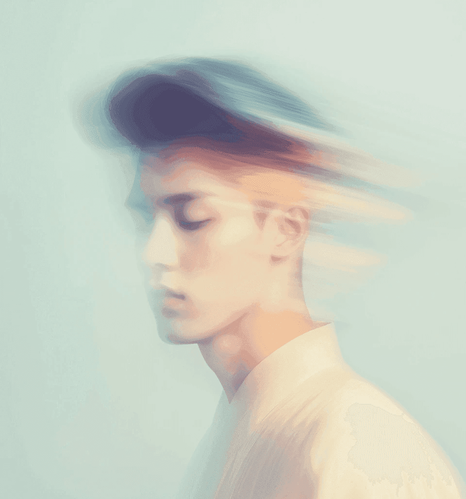 Blurred portrait of a person in soft pastel hues, facing left with closed eyes. The motion blur suggests movement and evokes a calm, ethereal mood.