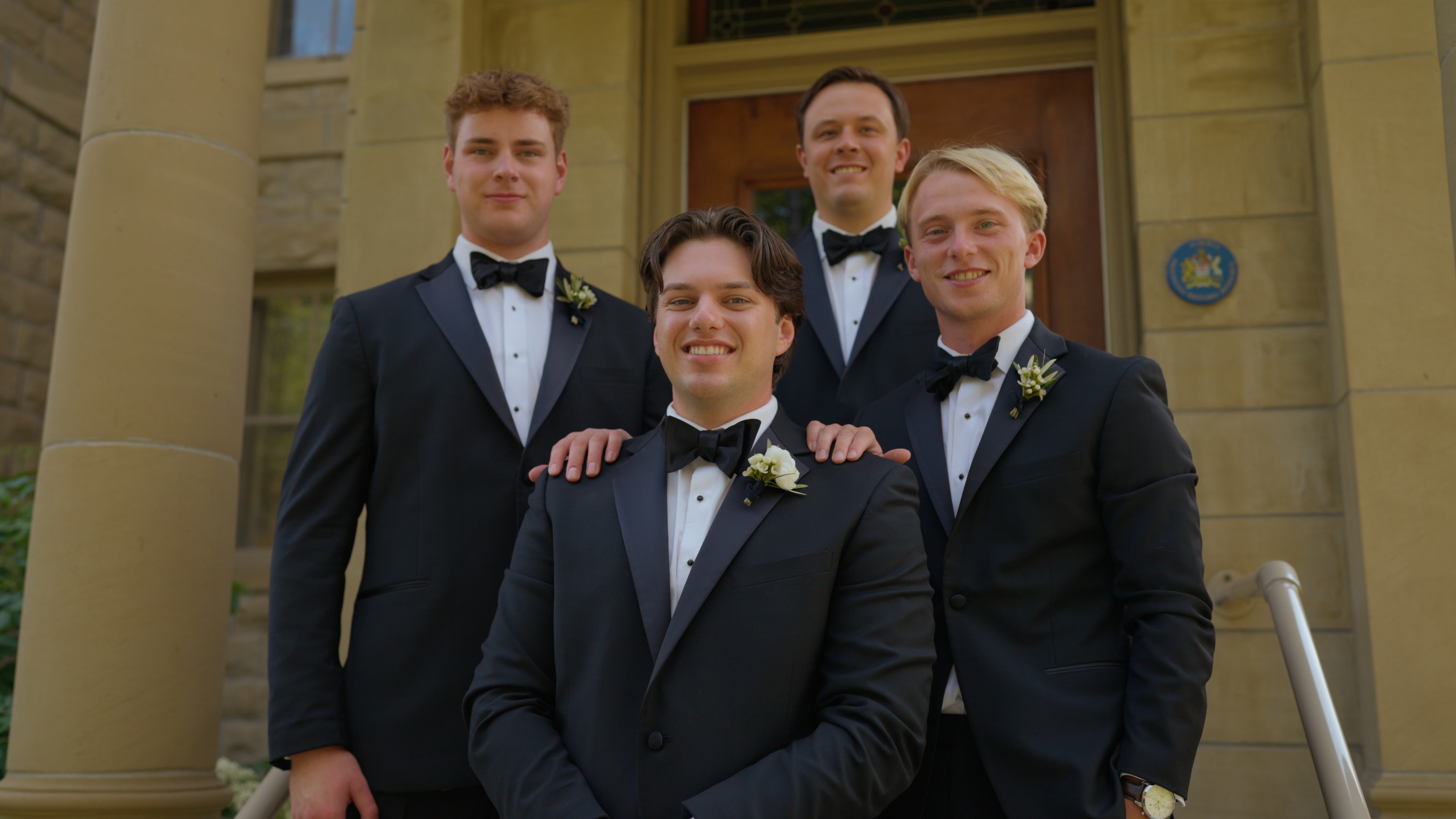 bride groom kissing stairs