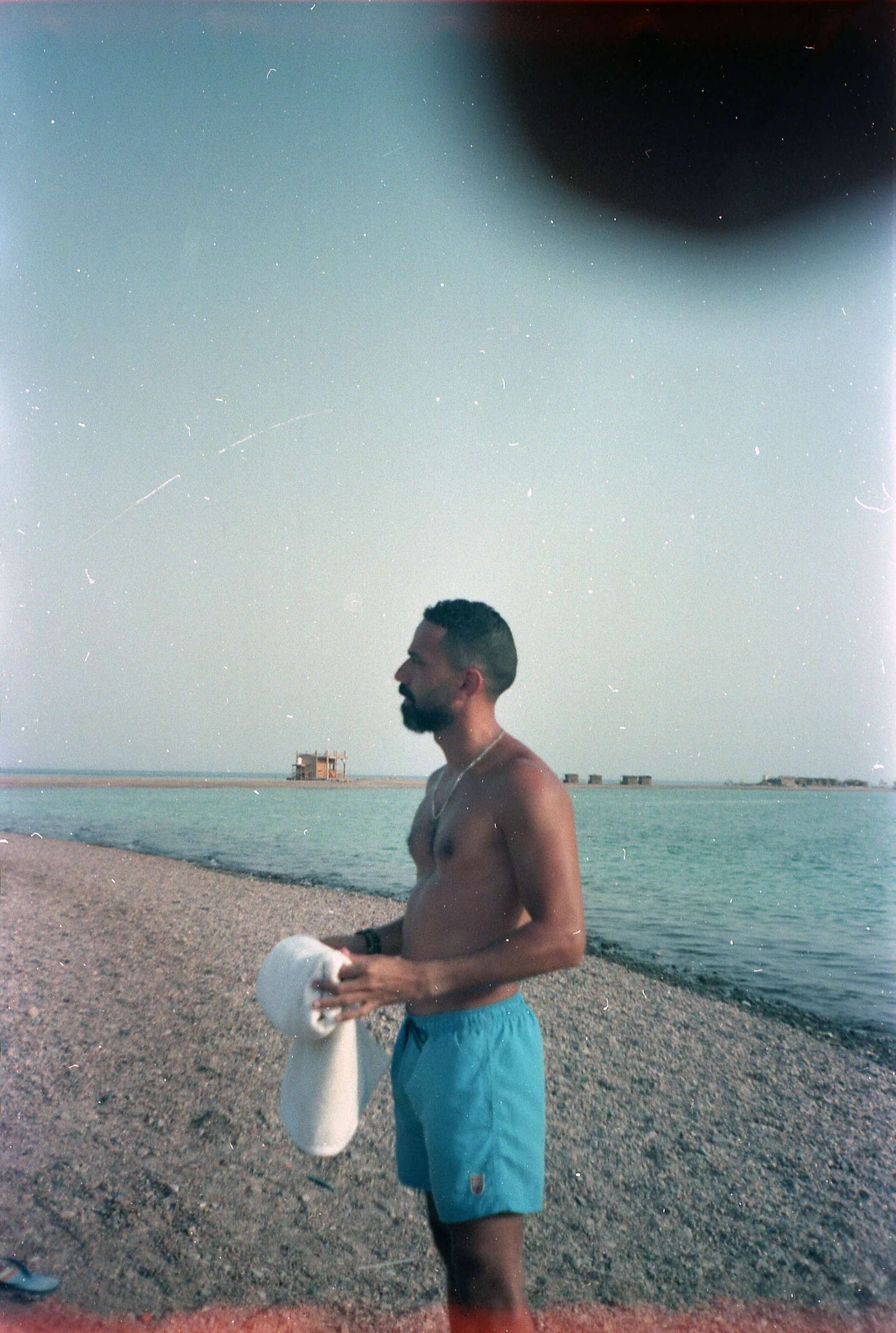 Standing by Turquoise Water