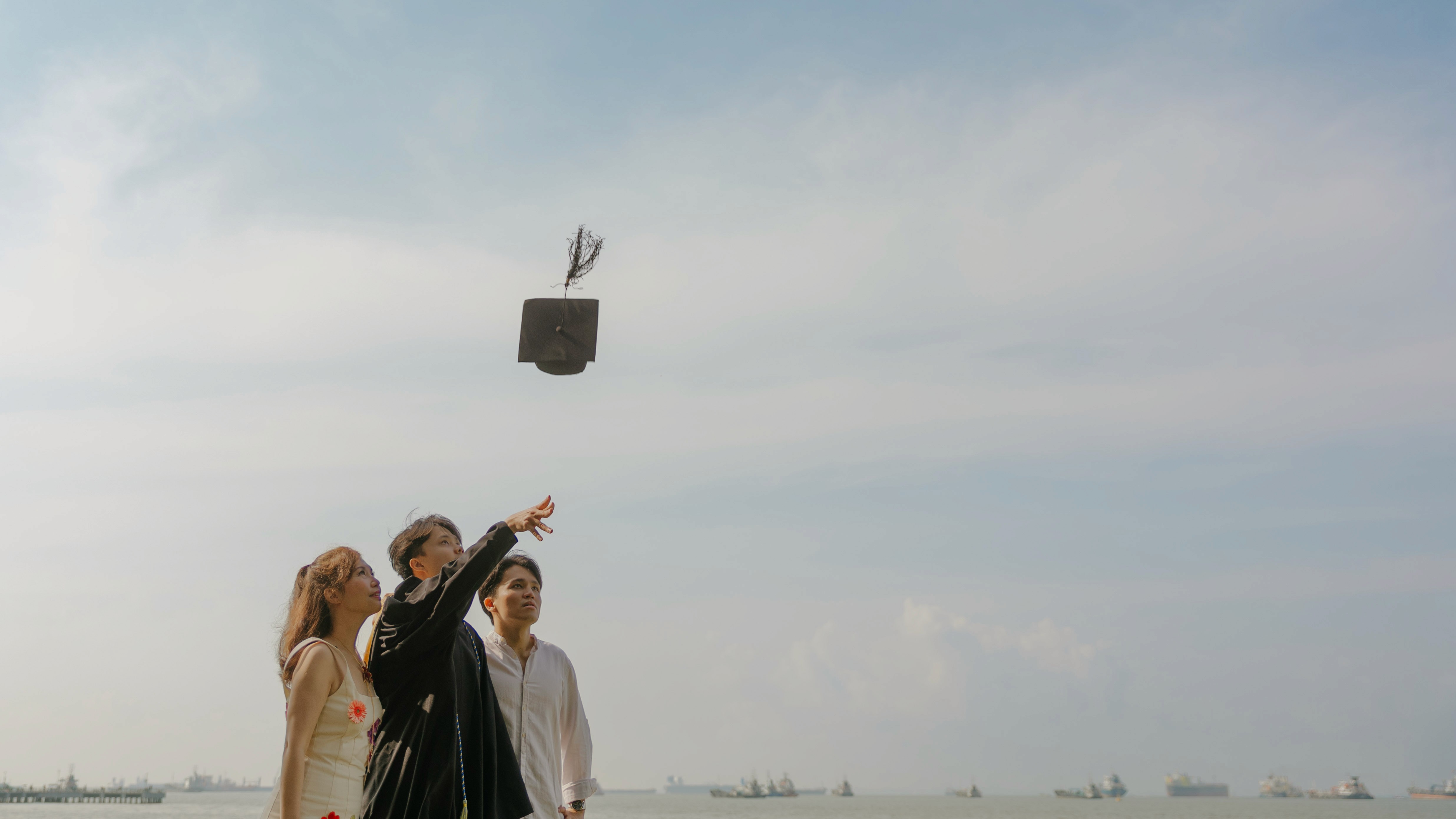 Graduation family portrait photography in Singapore outdoor session by JIREHTAKESPHOTOS