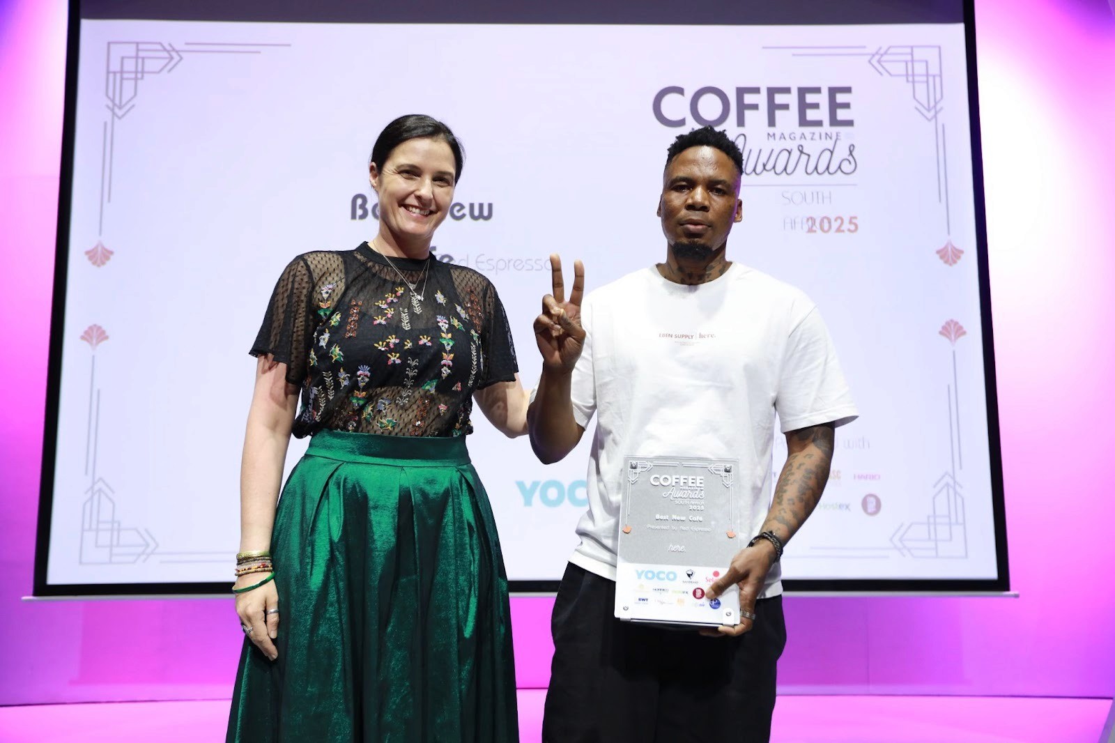 Best New Café Presented by Kirsty Reid of Red Espresso Accepted by Antony Sifiso of Here. Image courtesy of Coffee Magazine