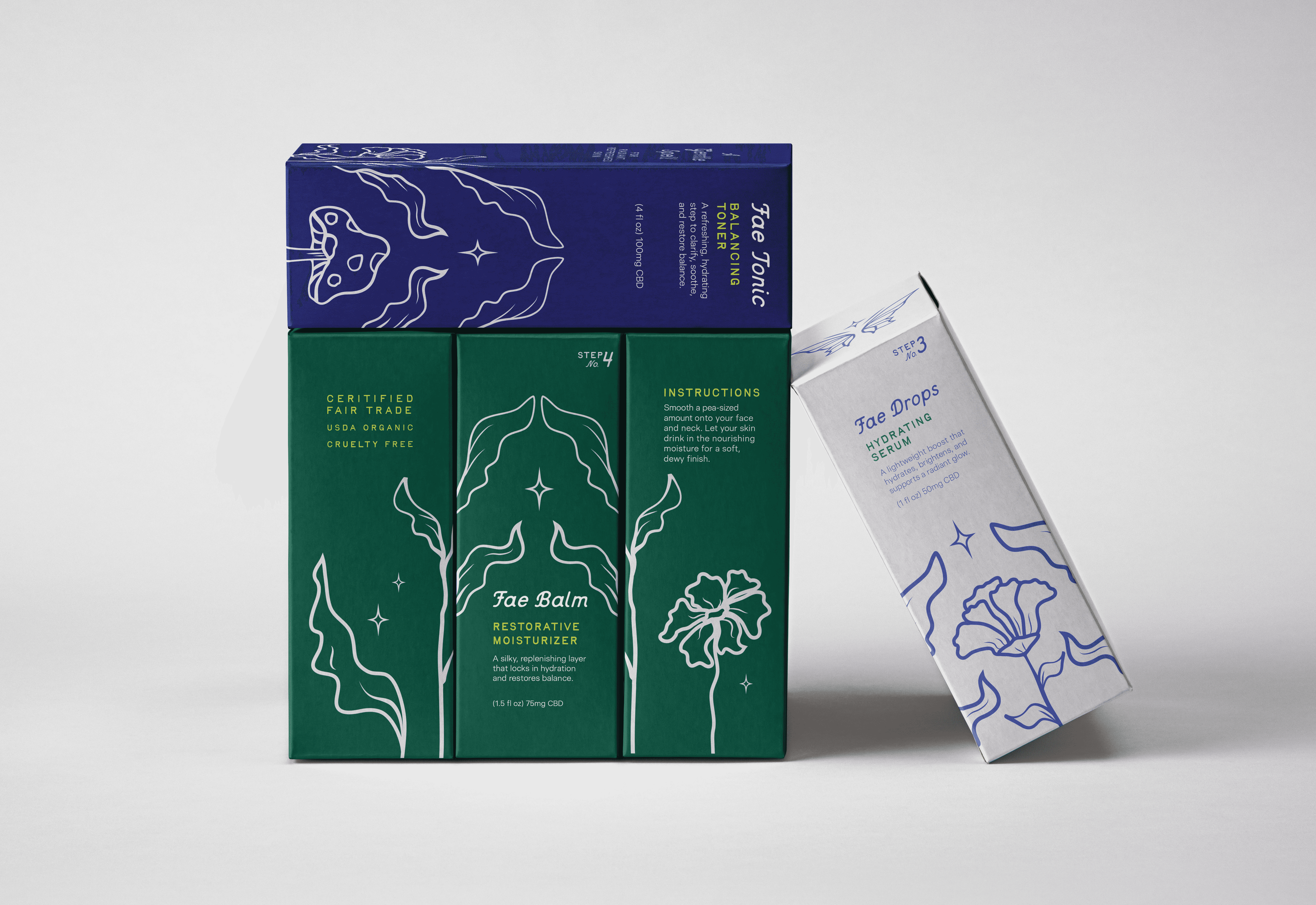 Fae Glow skincare boxes: blue toner, green balm, and gray serum.
