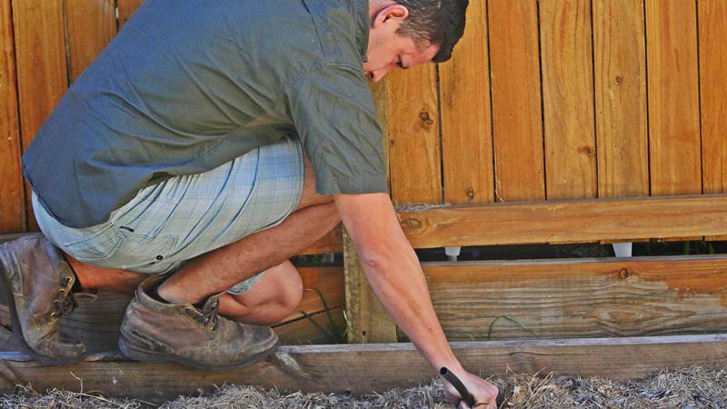 Someone checking items off of a check list