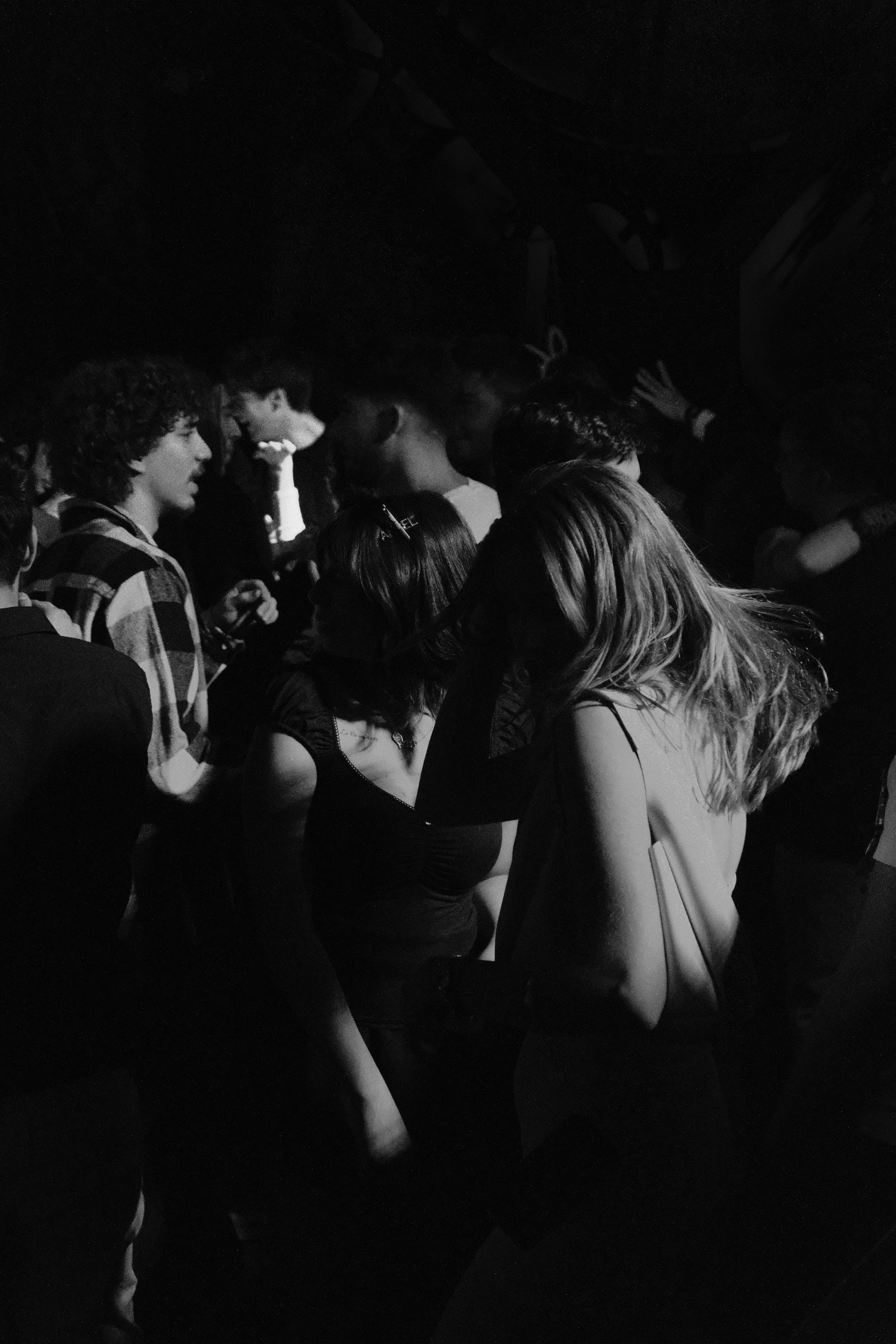 A black and white photo of a crowd of people