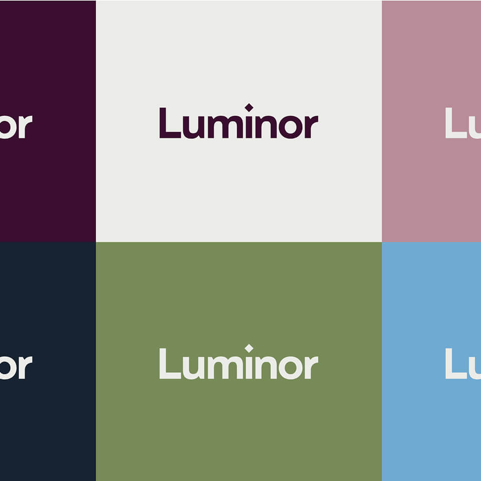 new Luminor logo on variety of coloured backgrounds