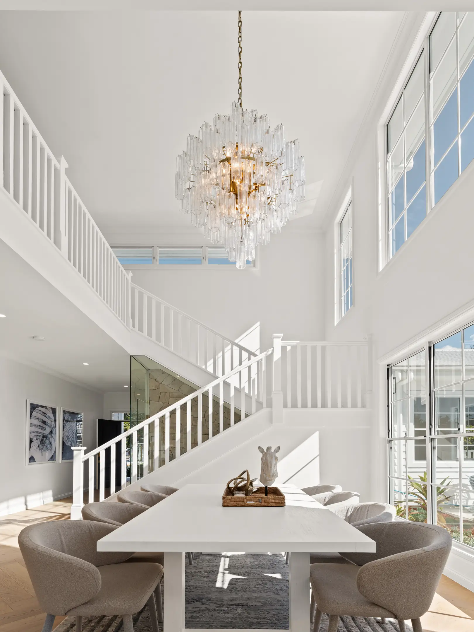 Natural light being brought into the home via a void and windows of a small lot Brisbane home