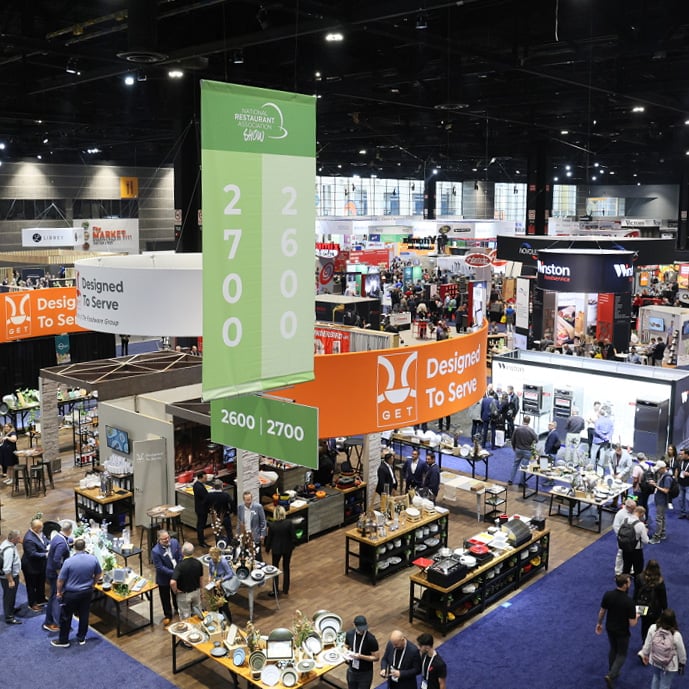 Medical imaging exhibit booth at RSNA Chicago with AV demo screens and private consultation meeting area