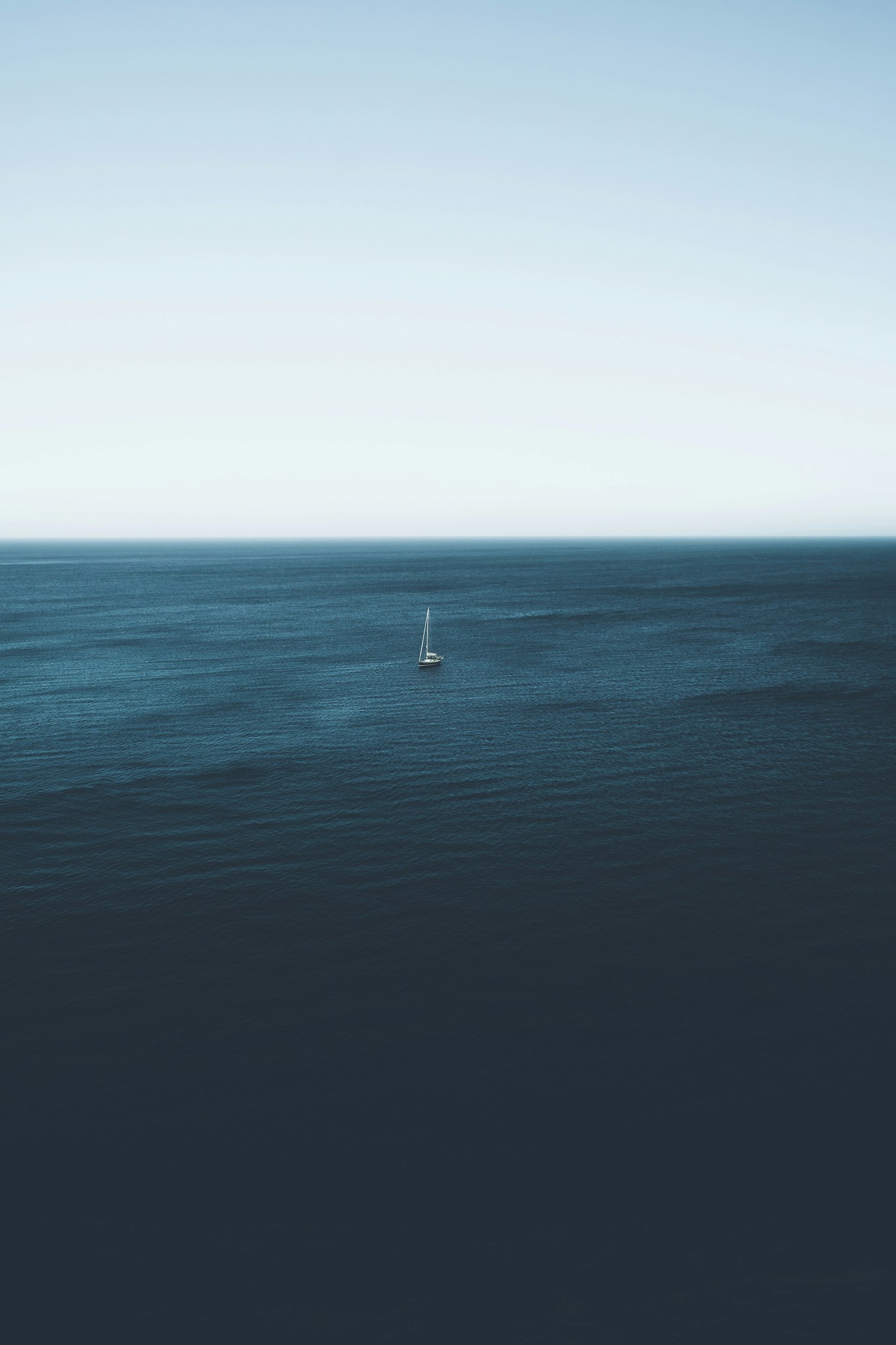sailboat on body of water during daytime