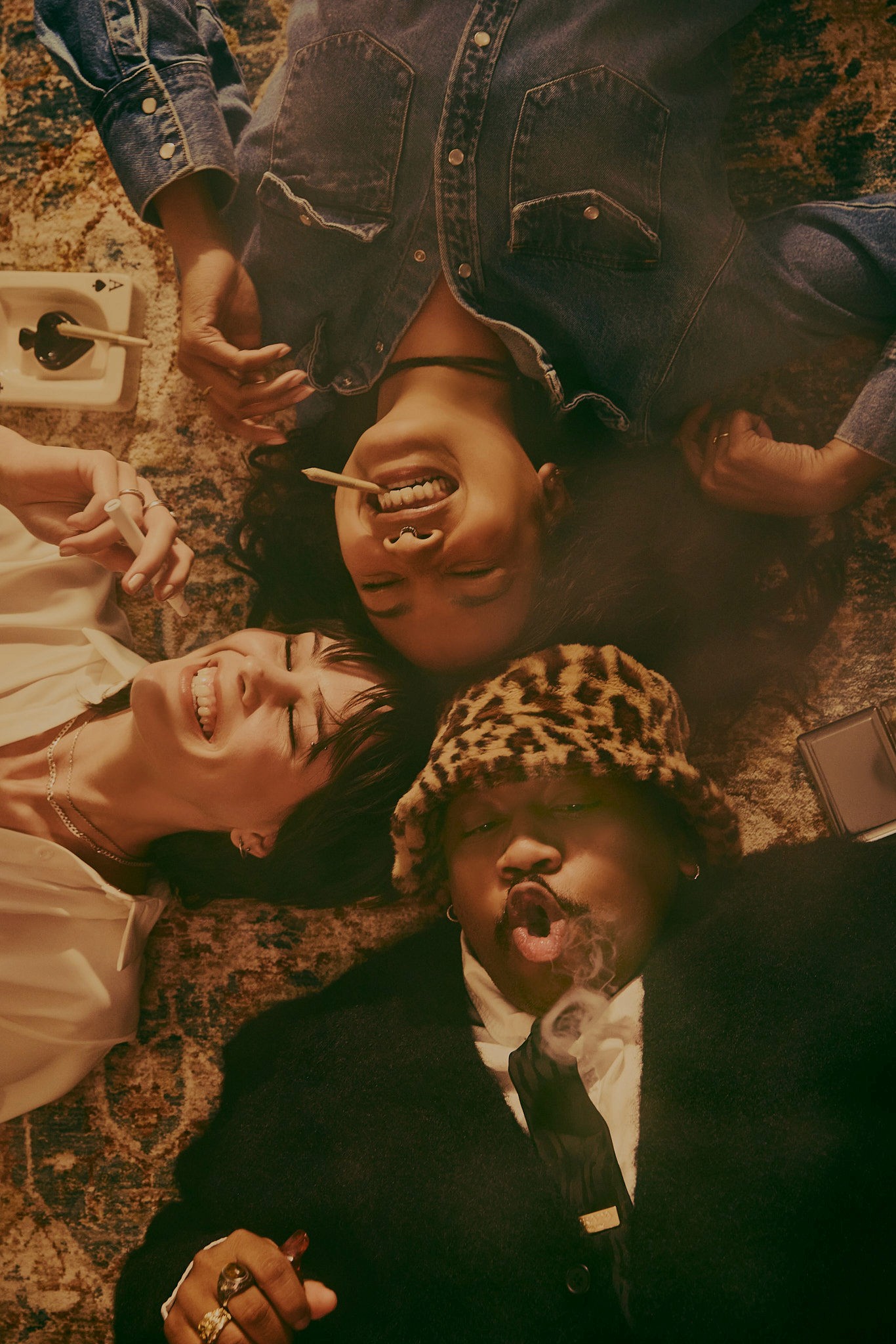 Woman with red hair covering mouth with hair