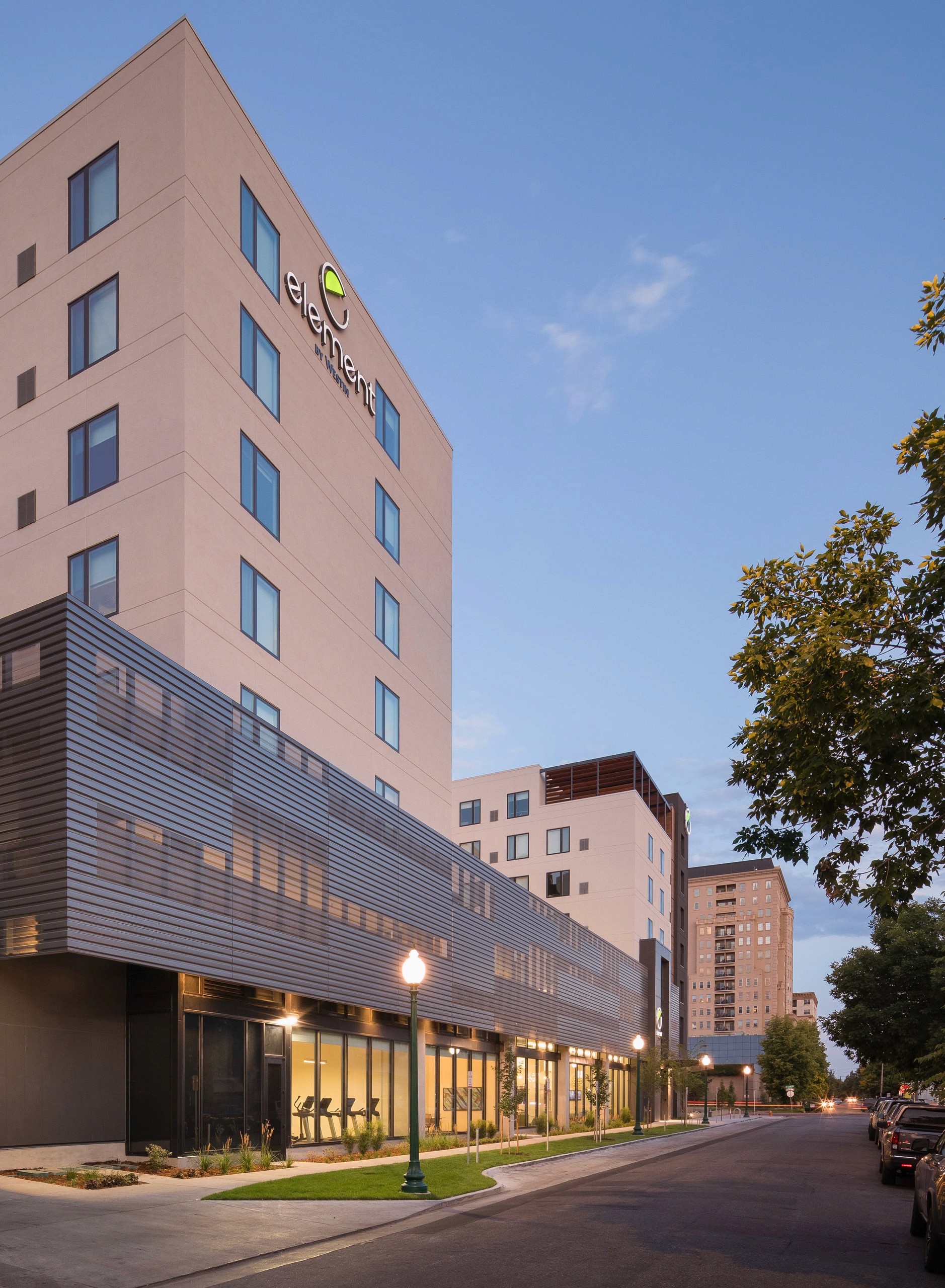 Element by Westin hotel building and street at dusk.