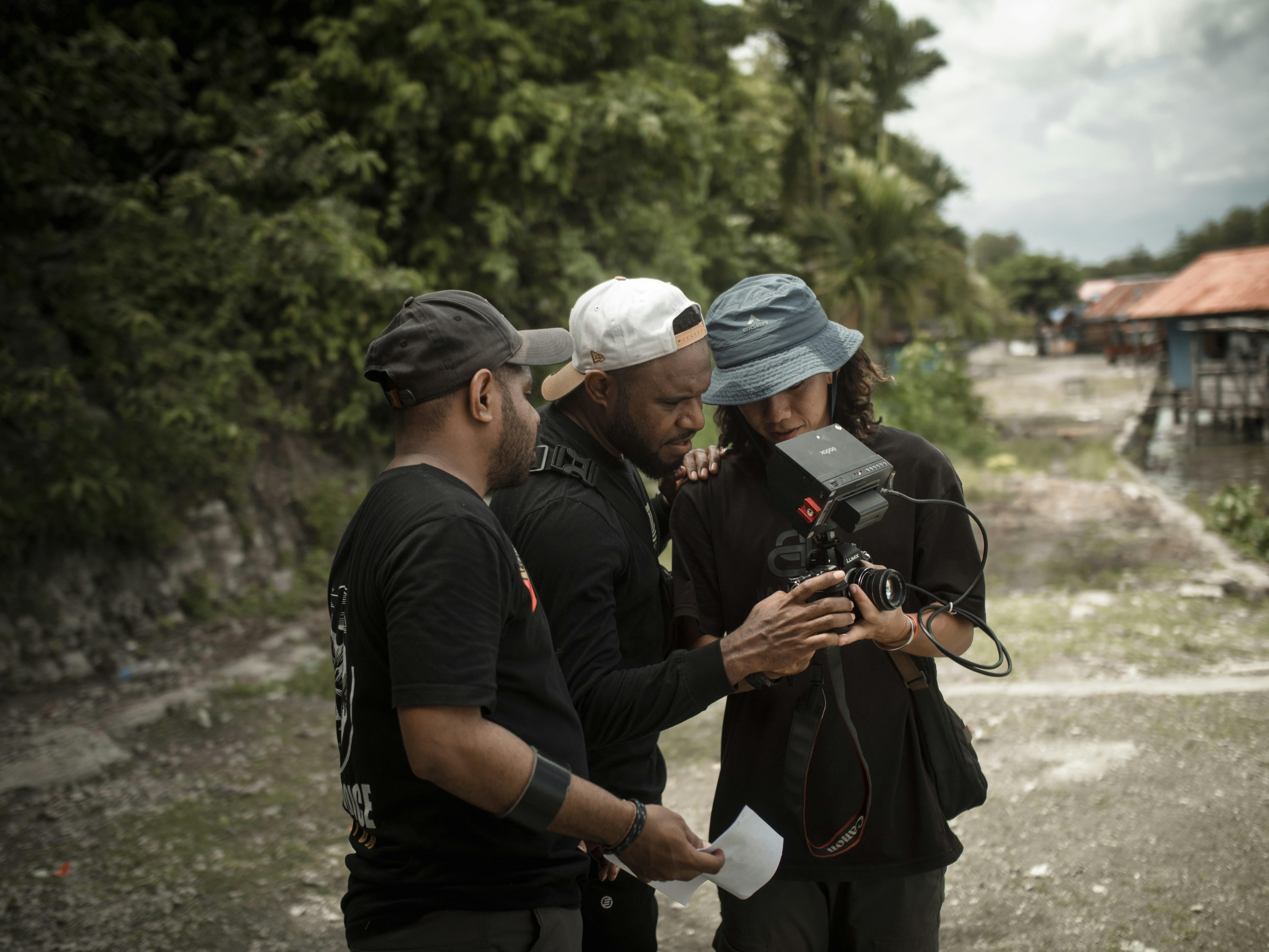 A group of people standing next to each other