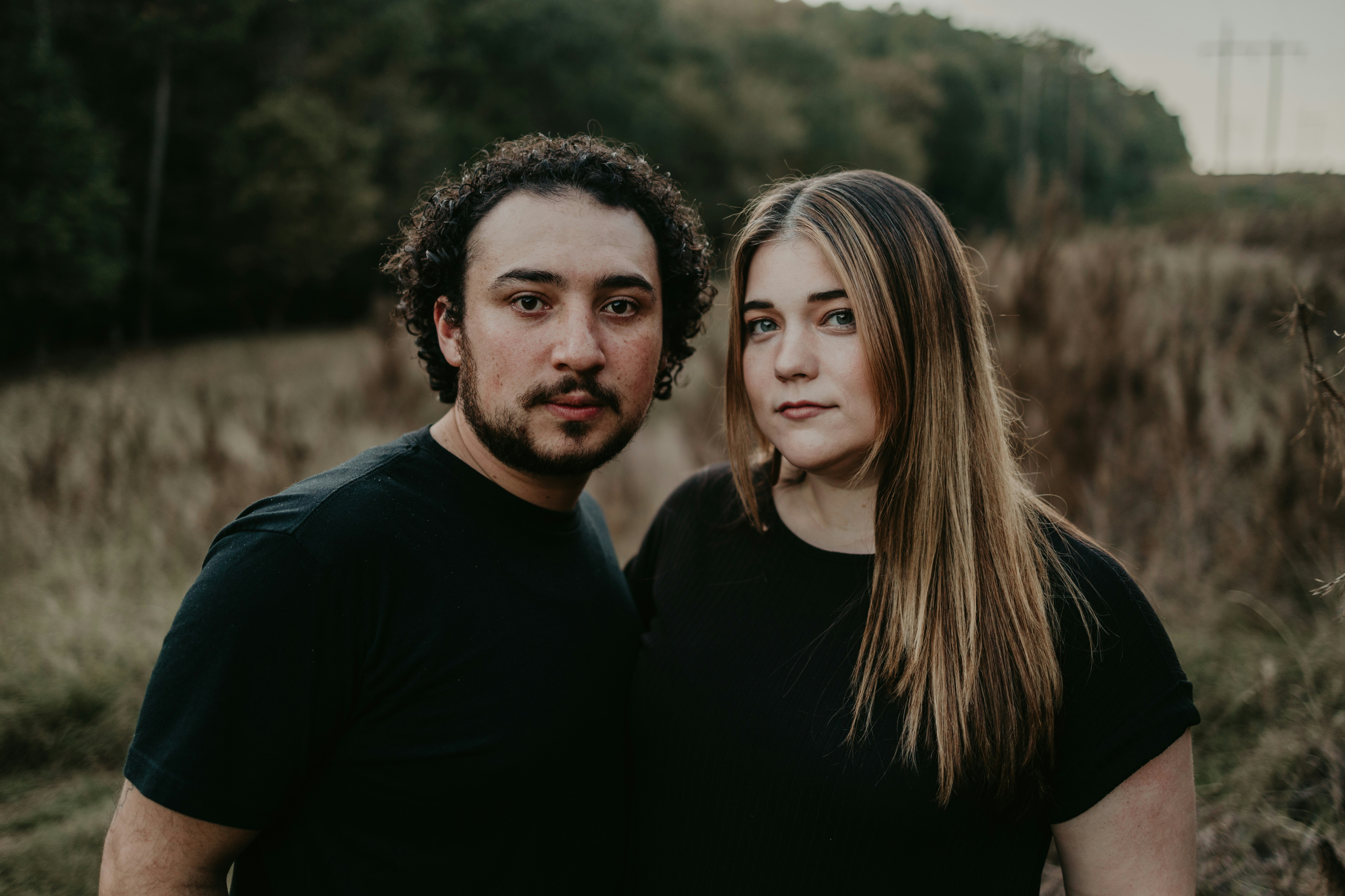 a man and a woman posing for a picture